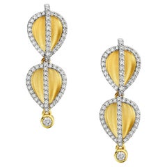 Boucles d'oreilles jumelles en forme de ballon avec diamants en or jaune 14 carats