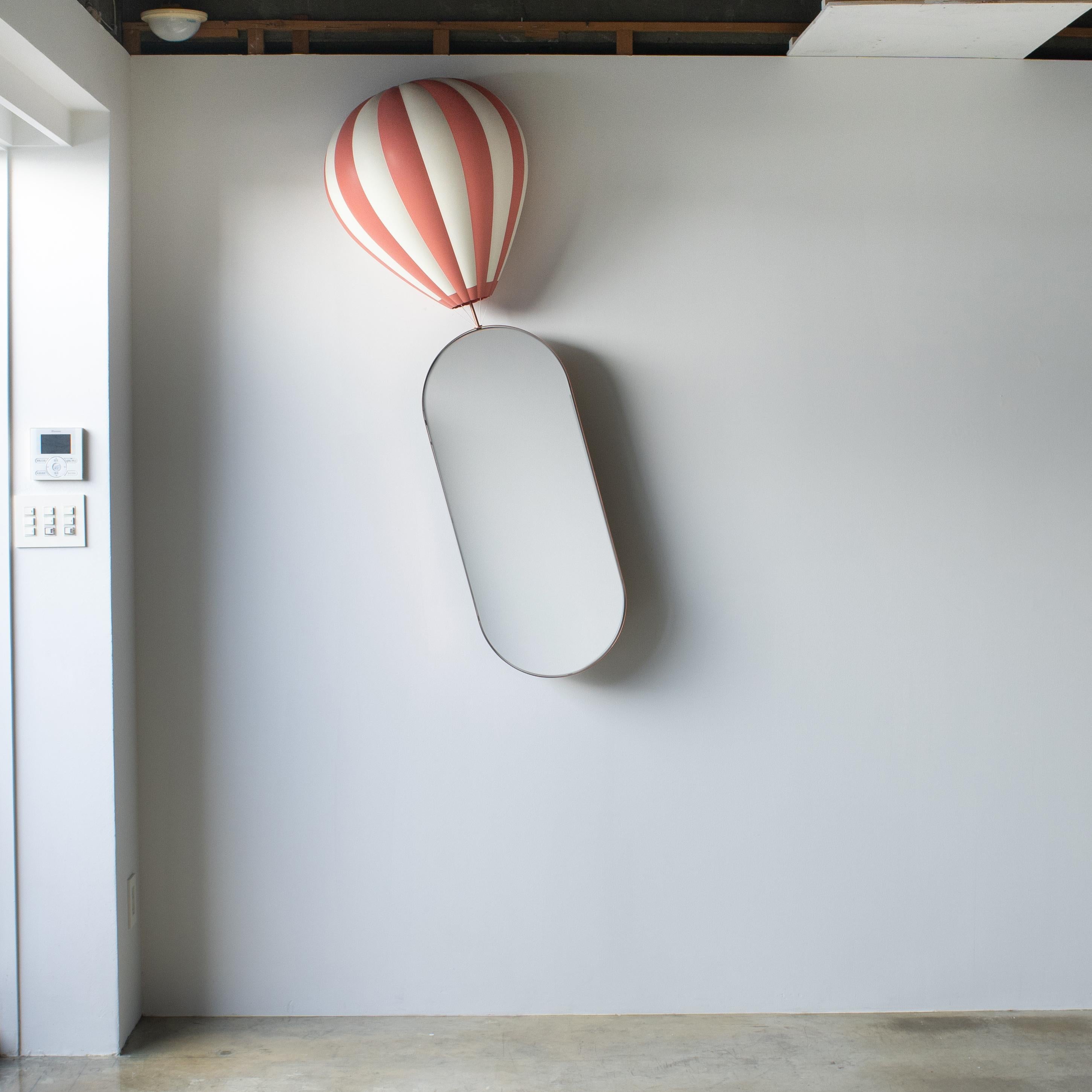 Balloon wall mirror designed by h220430, Satoshi Itasaka. 
Balloon is made of ABS plastic. Mirror base is made of steel. In the image, the mirror is slightly tilted. It can be installed with free angle such as vertically.
Cute and fantastic mirror. 