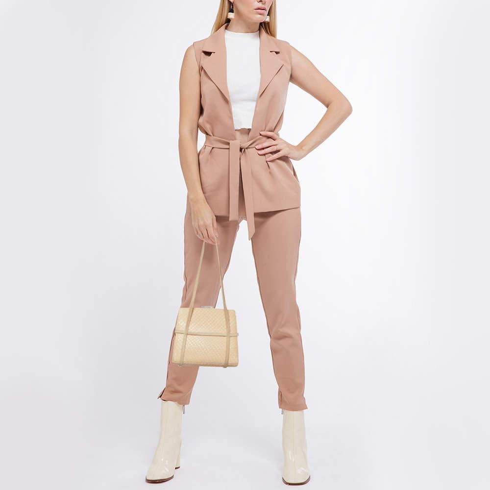 Designer bags are ideal companions for ample occasions! Here we have a fashion-meets-functionality piece crafted with precision. It has been equipped with a well-sized interior that can easily fit all your essentials.