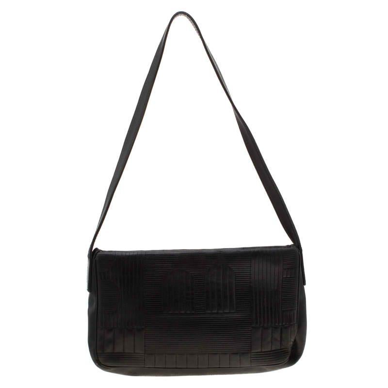 Designed in a gorgeous shade of black, this Bally bag is crafted from embossed leather. The simple creation features a single handle and a fabric interior that is sized to hold your daily necessities.

Includes: The Luxury Closet Packaging

