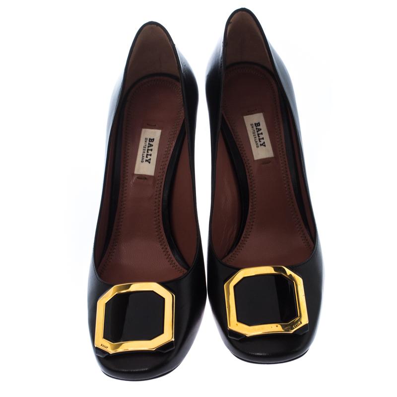 Treat your feet to the best of things by choosing these durable pumps from Bally! The black pumps come crafted from leather and designed with buckle detailing on the uppers. They are balanced on 8.5 cm block heels.

Includes: Original Box

