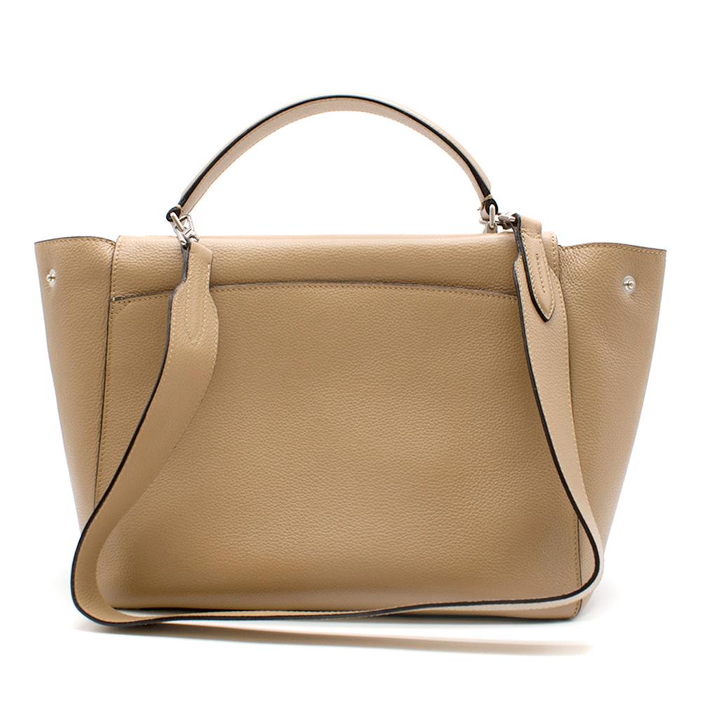 Bally Leather Breeze Beige Small Top handle Bag

- A softer, more relaxed iteration of the B-Turn Bag, this womans Breeze top handle bag comes in a luxurious plain leather
- It features a B-Turn lock that sits in front of the bag
- Side press stud