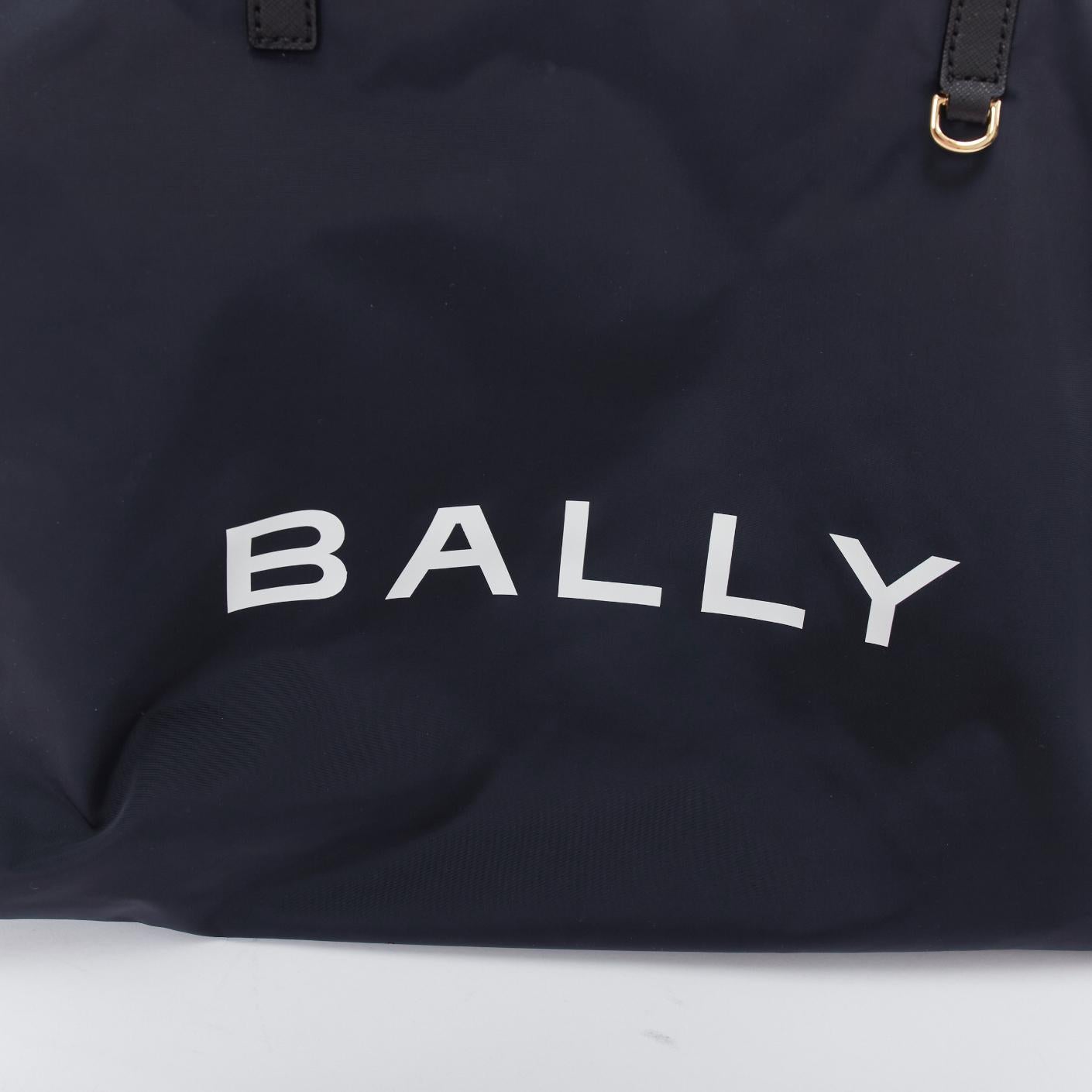 BALLY navy nylon white logo travel luggage foldable shoulder tote bag For Sale 1