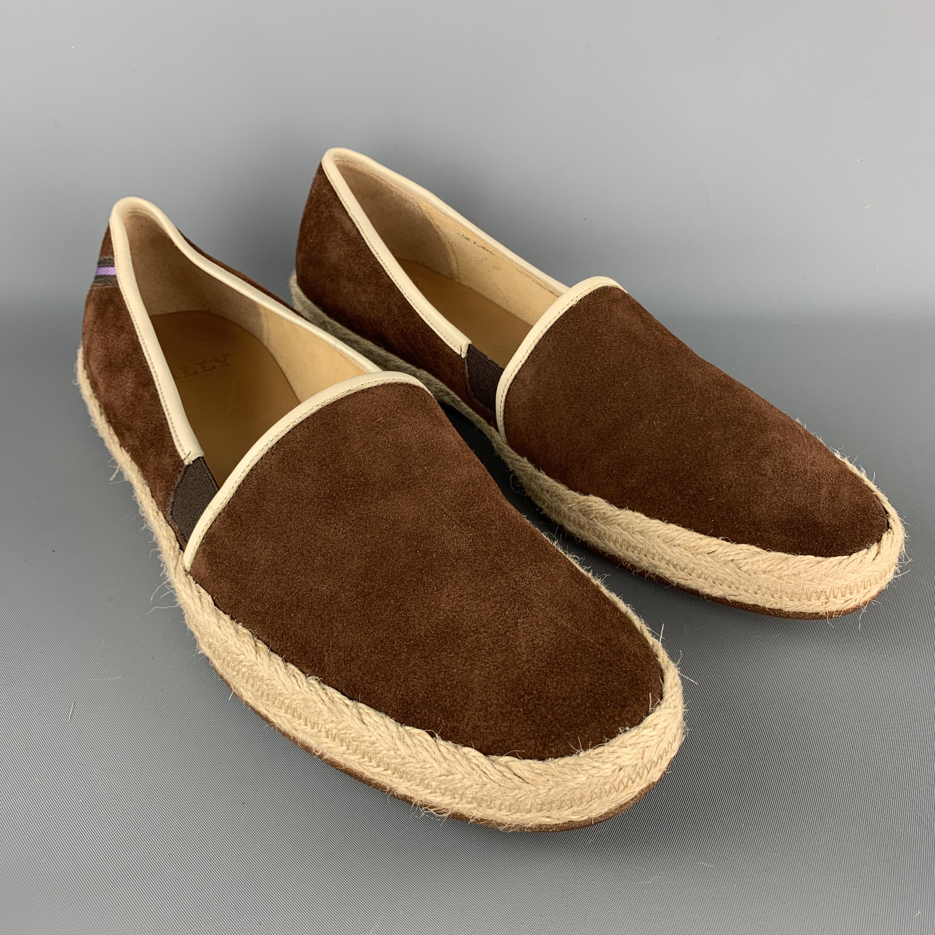 BALLY slip ons come in brown suede with braided trim. Made in Italy.

Excellent Pre-Owned Condition.
Marked:USA 10

Outsole: 12 x 4 in.