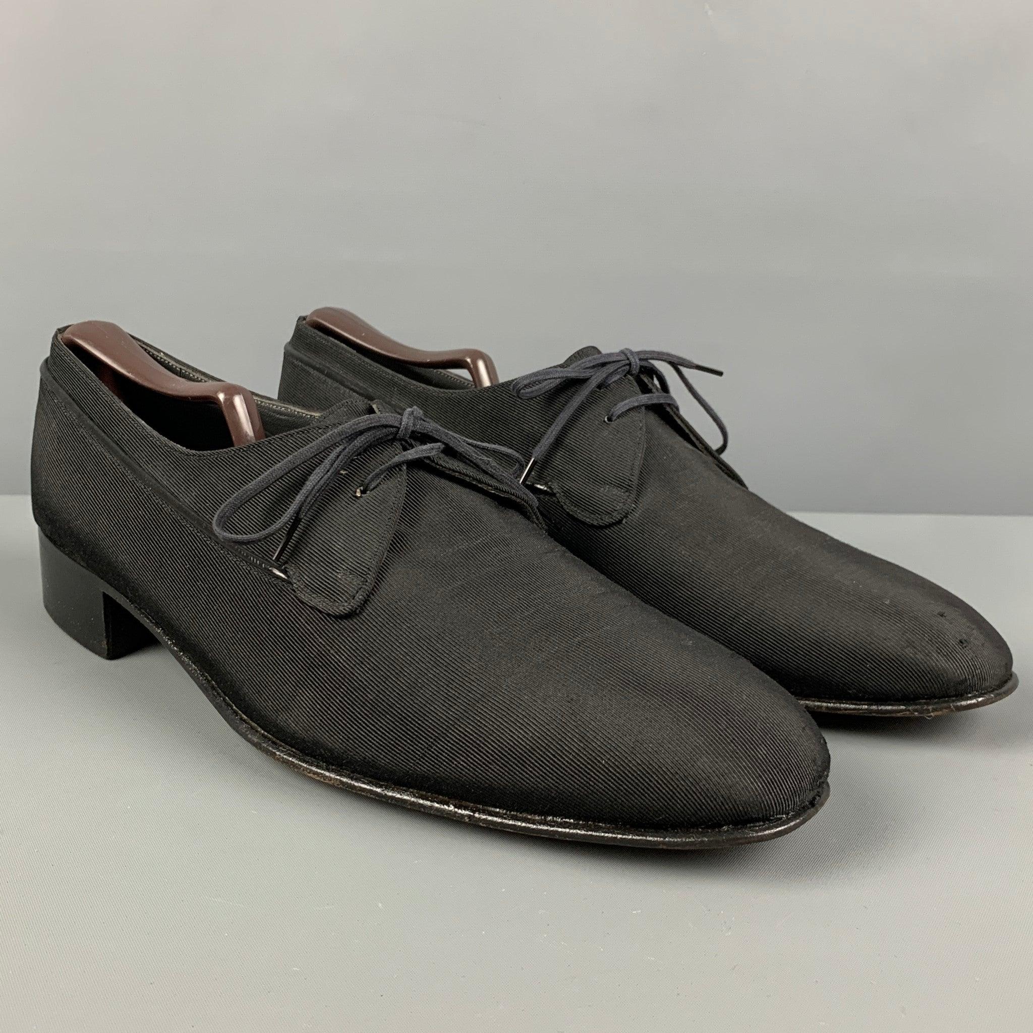 BALLY shoes comes in a black material featuring a square toe, leather trim, low heel, and a lace up closure.
Very Good
Pre-Owned Condition. 

Marked:   11.5 MOutsole: 12 inches  x 4 inches 
  
  
 
Reference: 121779
Category: Lace Up Shoes
More