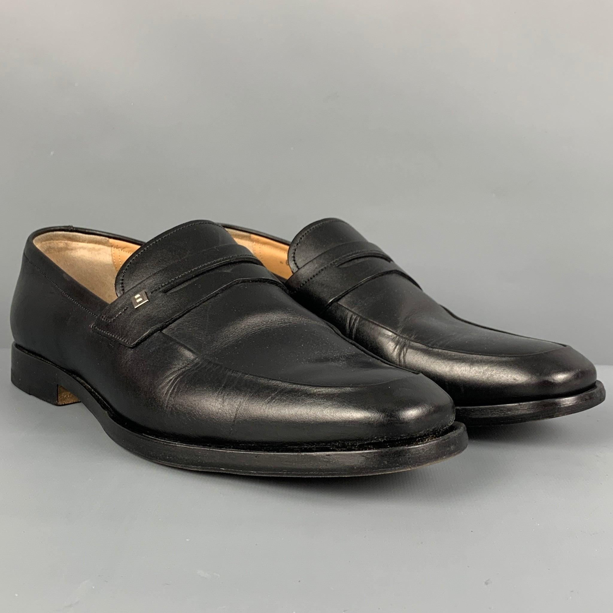 BALLY loafers comes in a black leather featuring a square toe featuring a penny strap, silver tone logo detail, square toe, and a slip on style.
 Very Good
 Pre-Owned Condition. 
 

 Marked:  EU 6 F / US 7 E Outsole: 11.5 inches x 4 inches 
  
  
 