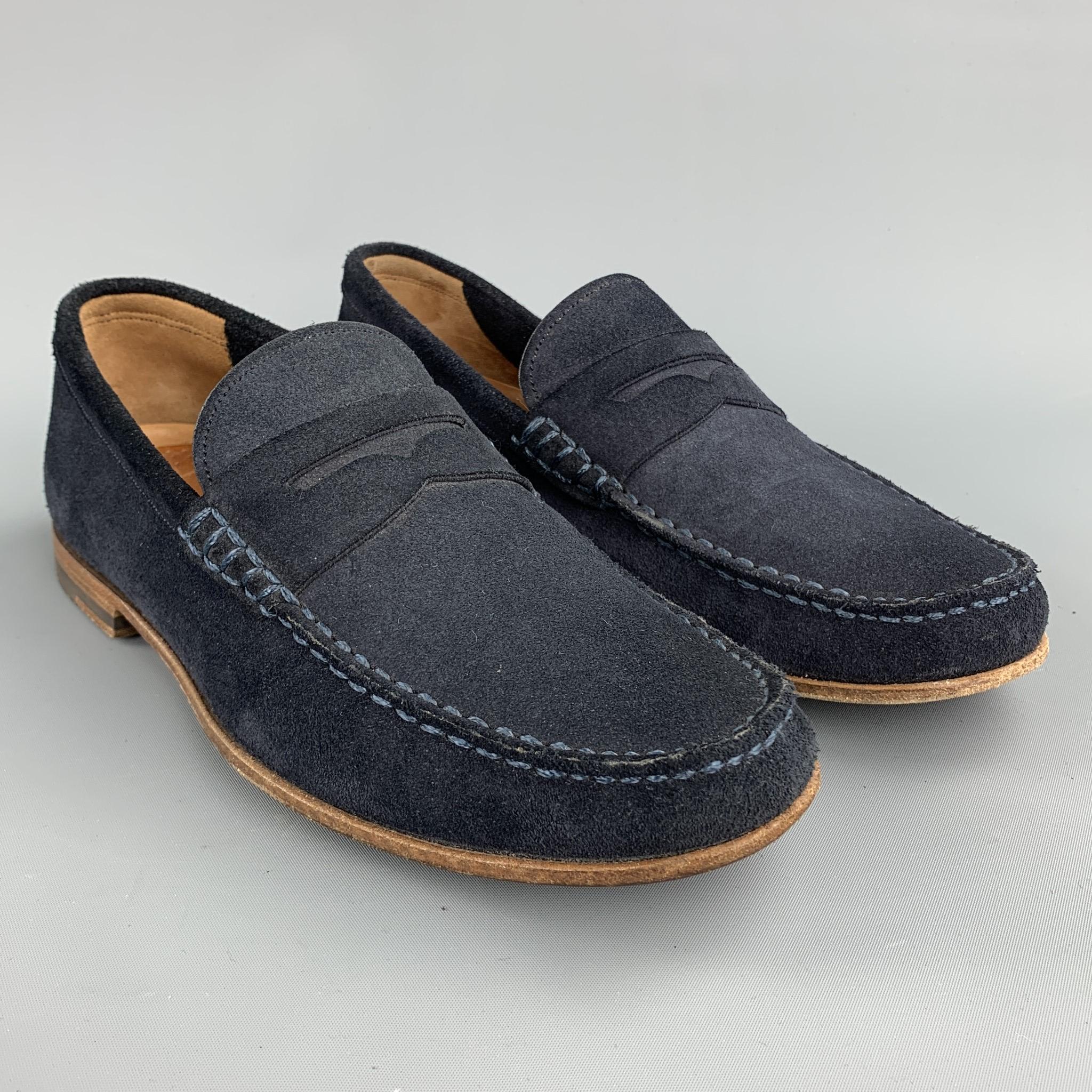 BALLY loafers comes in a navy suede featuring slip on style, contrast stitching, and a wooden sole. Made in Switzerland.

Excellent Pre-Owned Condition.
Marked: 41

Outsole: 

11 in. x 4 in. 

SKU: 72998
Category: Loafers

More Details
Brand: