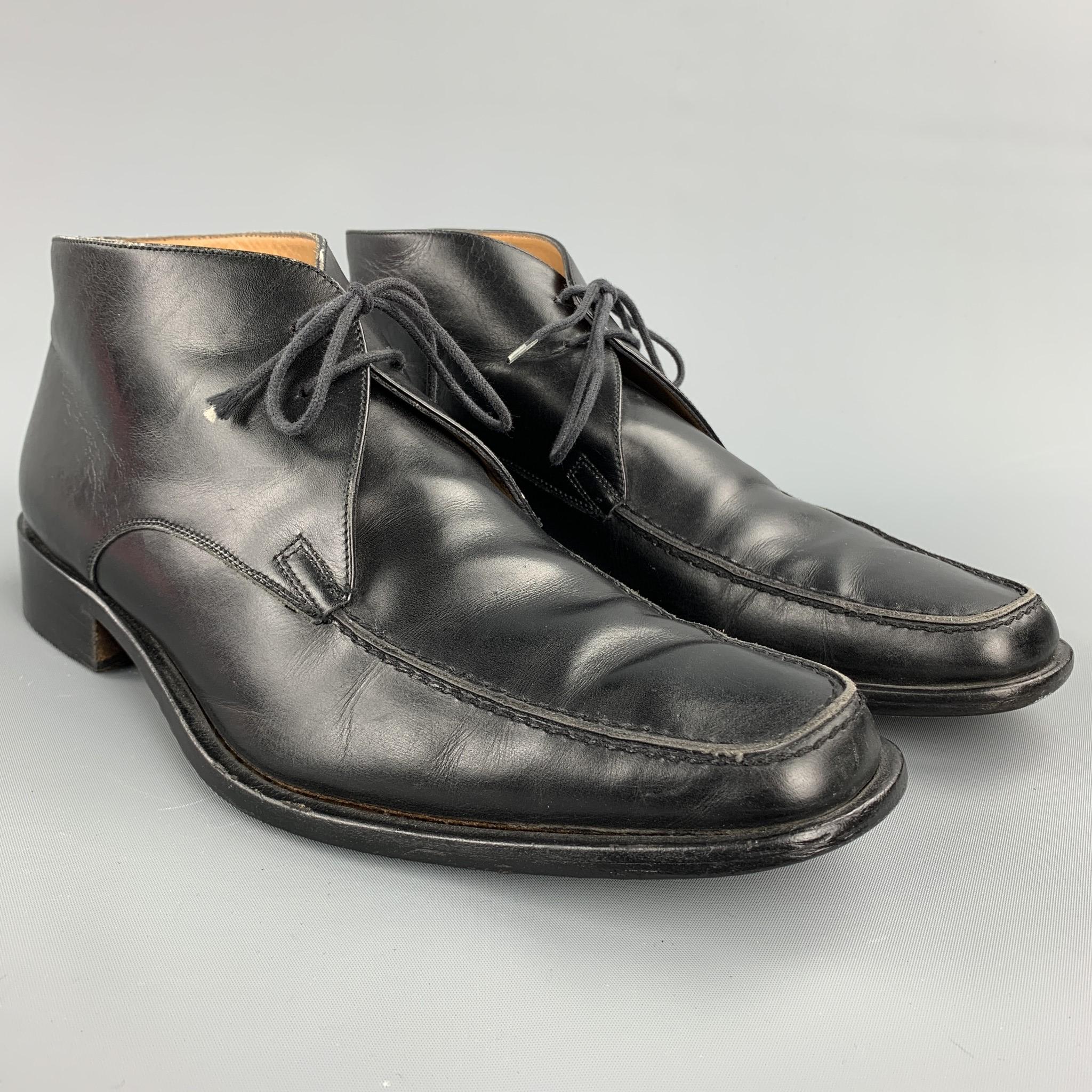 BALLY lace up shoes comes in a black leather featuring a chukka style and a wooden sole. Made in Italy.

Very Good Pre-Owned Condition.
Marked: 8 E

Outsole: 

12 in. x 4 in. 

SKU: 72963
Category: Lace Up

More Details
Brand: BALLY
Size: 9
Color: