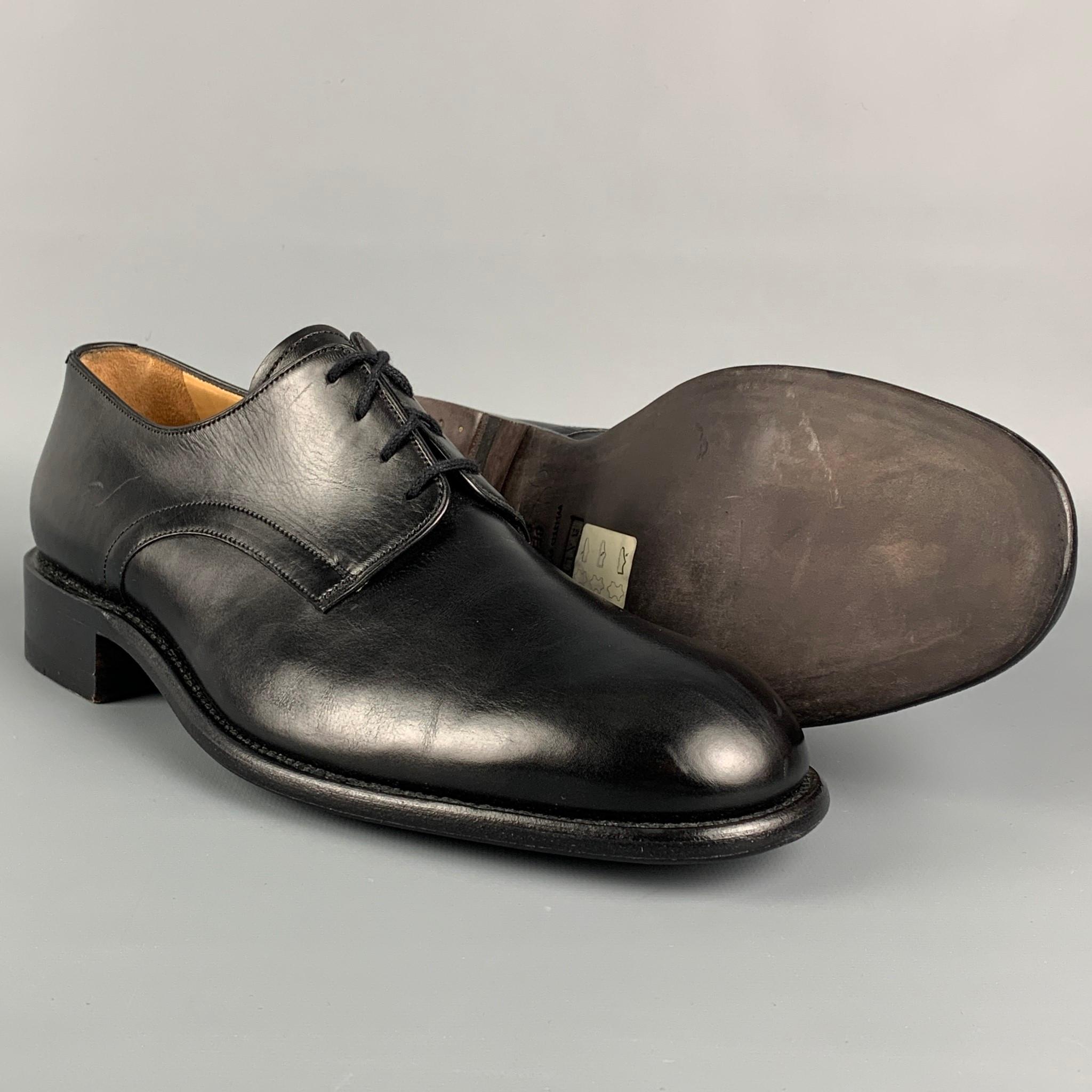 BALLY dress shoes comes in a black leather featuring a classic style and a lace up closure. Shoe trees included.

New With Box. 
Marked: US 9 / EU 8

Outsole: 11.5 in. x 4.25 in. 