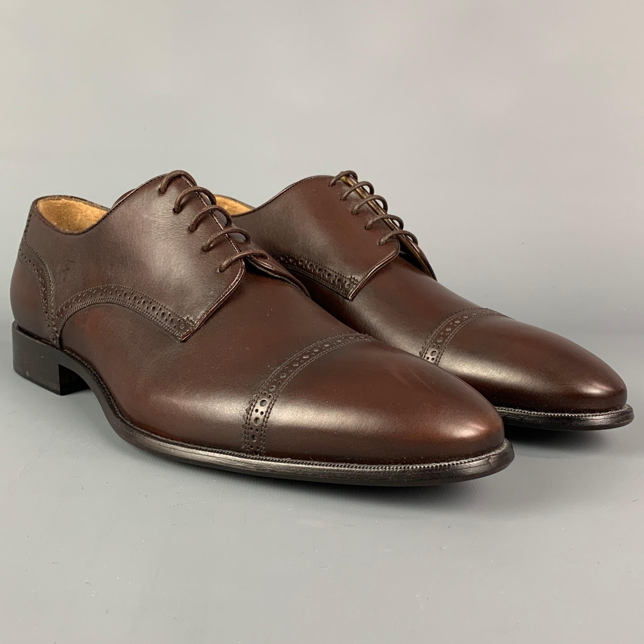 BALLY shoes comes in a brown leather featuring a cap toe, leather sole, and a lace up closure. 

New Without Tags. 
Marked: 8.5 EU / 9.5 US

Outsole: 12.5 in. x 4.25 in. 