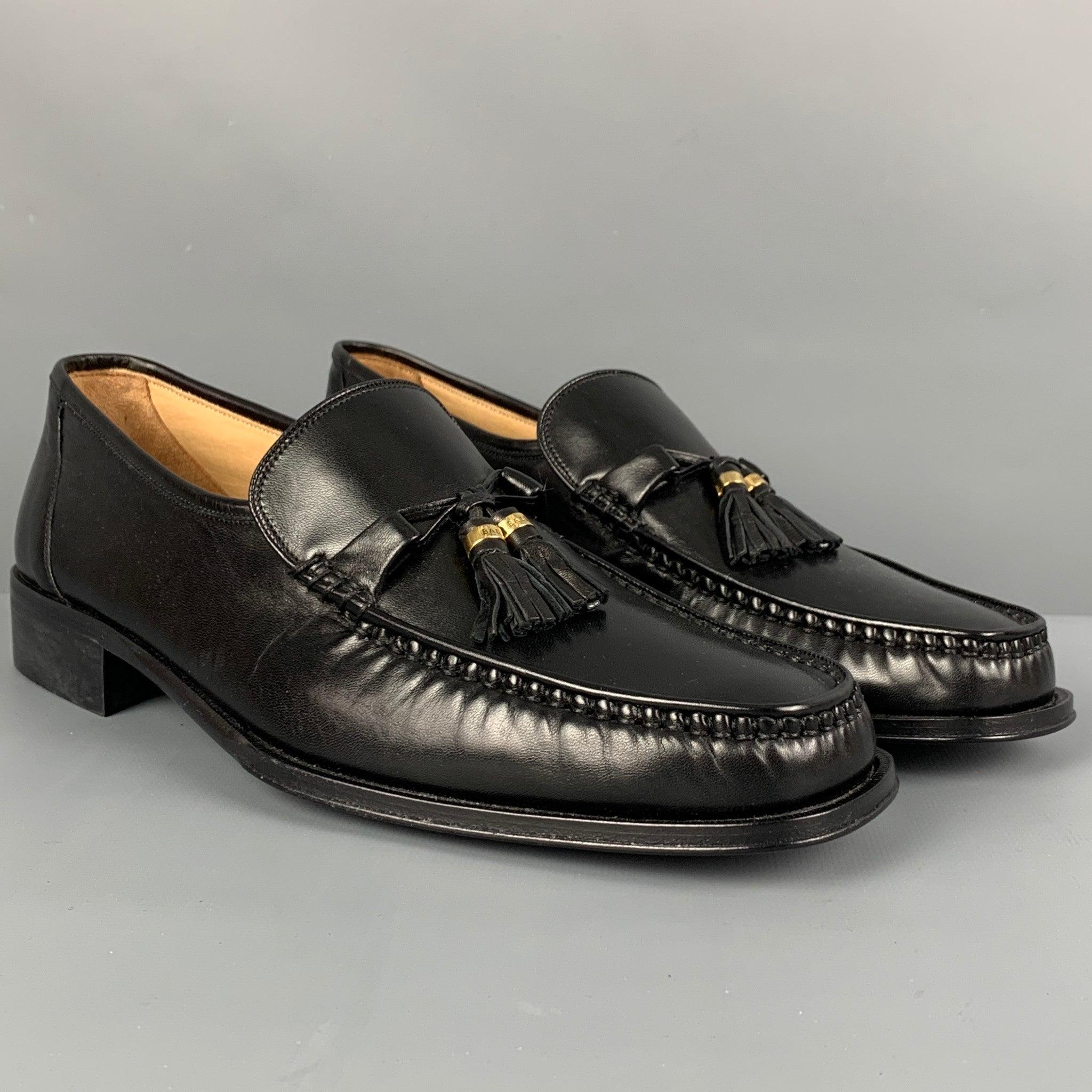 BALLY loafers comes in a black leather featuring a slip on style, front tassels, and a gold tone hardware, and a square toe. Excellent
Pre-Owned Condition. 

Marked:   8.5  9.5 B Outsole: 11.5 inches  x 4 inches 
  
  
 
Reference: 115153
Category:
