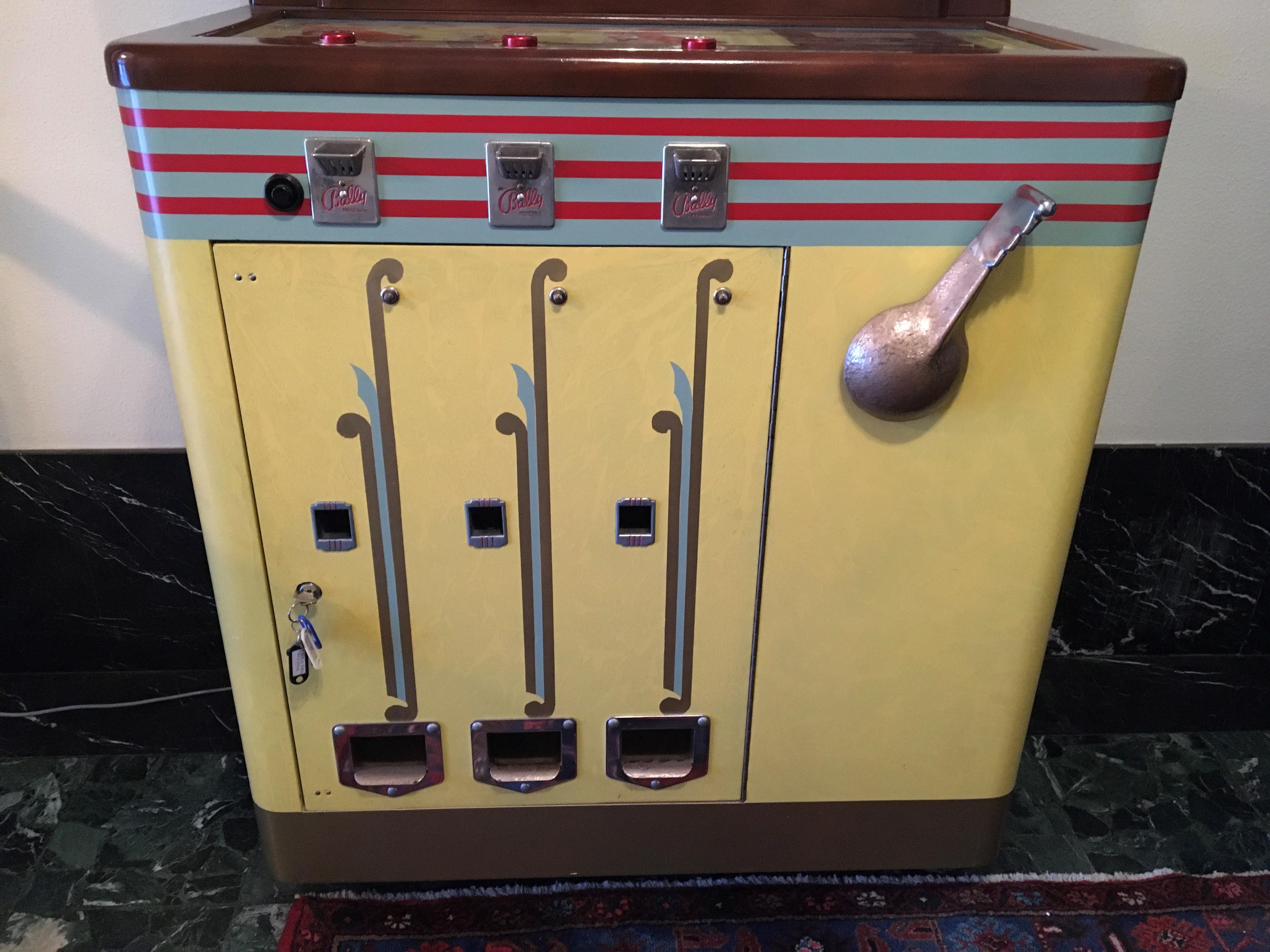 Art Deco Bally Triple Bell Console Slot Machine Game, 1946 For Sale