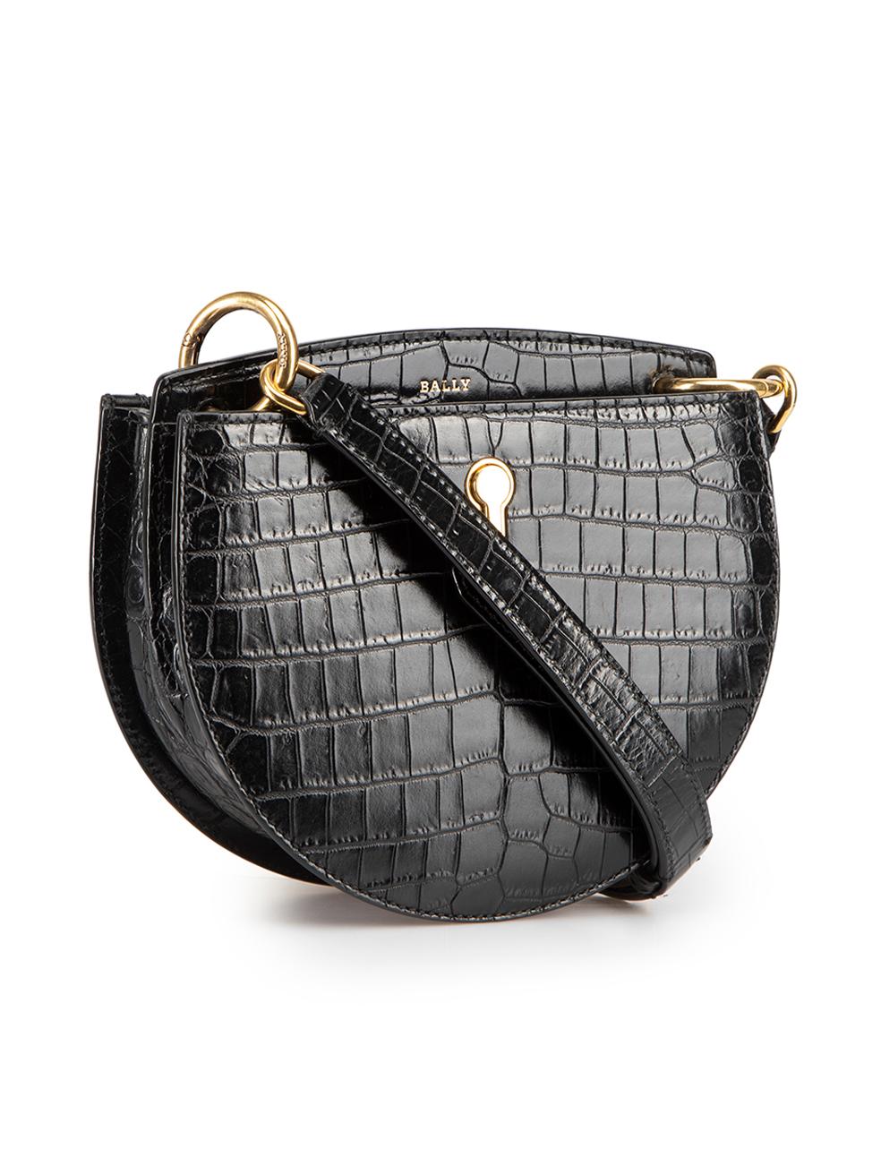 CONDITION is Very good. Minimal wear to handbag is evident. Minor scratching along outer hardware on this used Bally designer resale item. This item comes with original dustbag.



Details


Black

Leather

Mini crossbody bag

Crocodile embossed