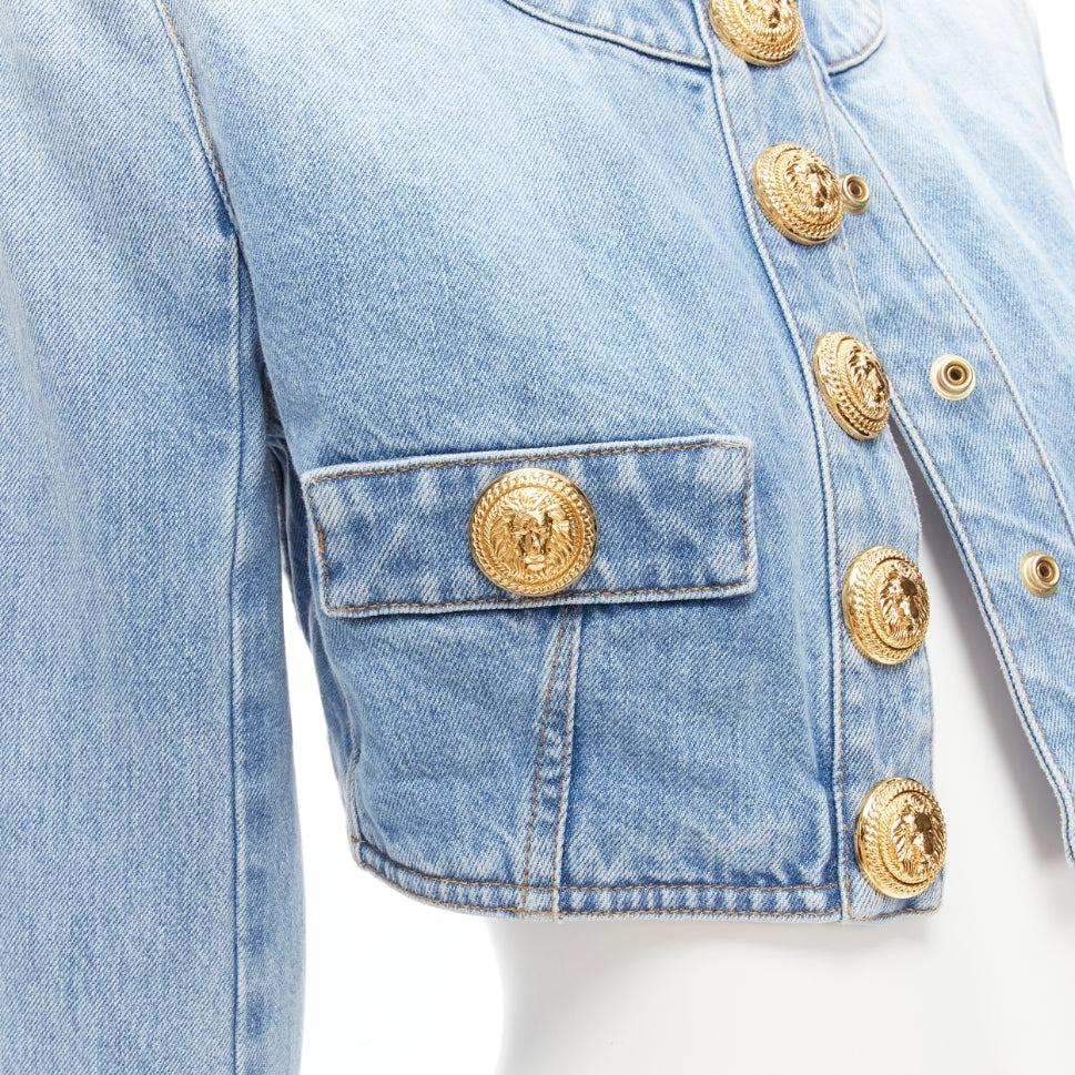 BALMAIN 2022 blue washed denim gold buttons cropped power jacket FR34 XS
Reference: AAWC/A00521
Brand: Balmain
Designer: Olivier Rousteing
Collection: 2022
Material: Denim
Color: Blue
Pattern: Solid
Closure: Snap Buttons
Extra Details: Gold