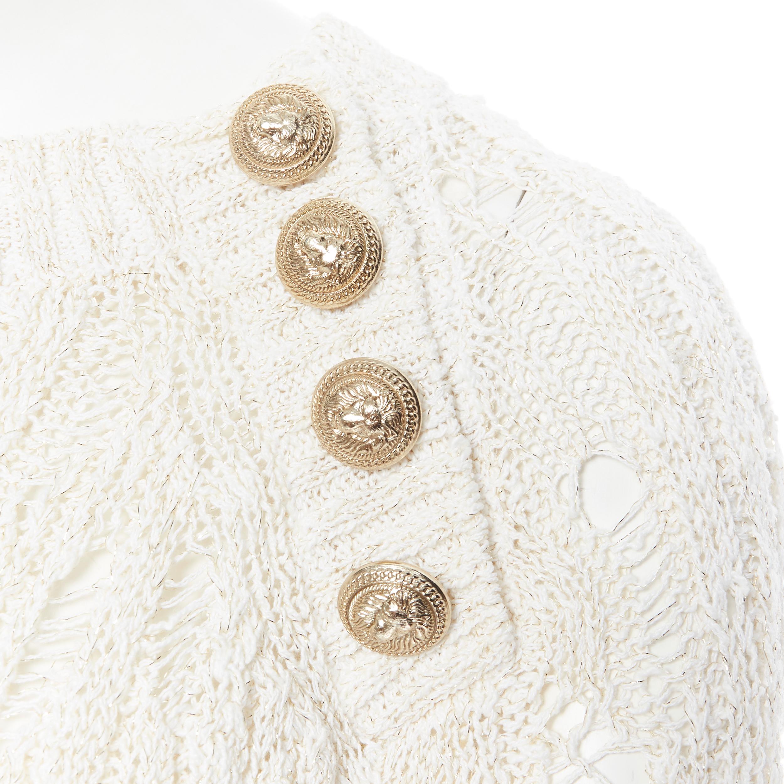 BALMAIN beige gold lurex loose holey knit military lion button sweater FR42 L
Brand: Balmain
Designer: Olivier Rousteing
Model Name / Style: Loose knit sweater
Material: Cotton blend
Color: Beige
Pattern: Solid
Extra Detail: Cotton blend. Beige with