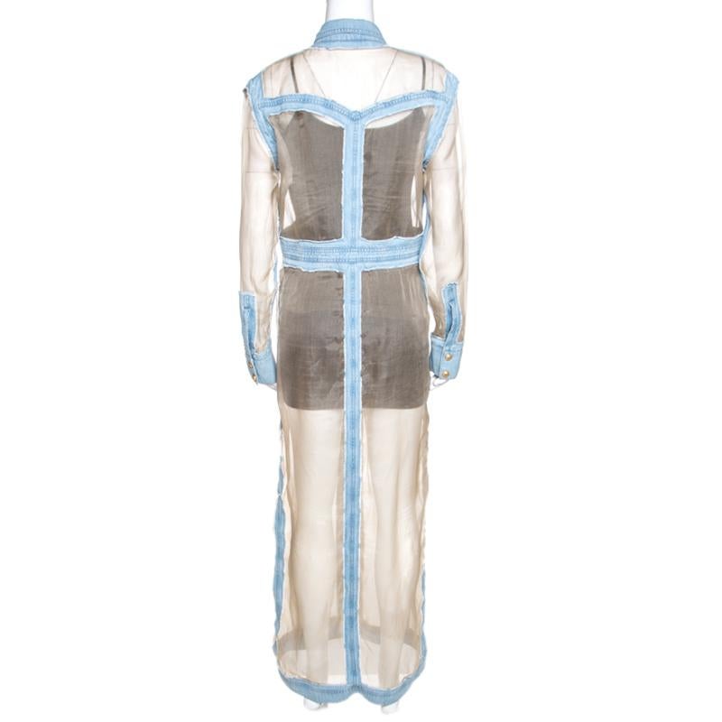 Exuding a cool-casual appeal and designed with refreshing details, this dress from Balmain will make a unique addition to your closet. It is tailored from silk into a shirt silhouette featuring cotton denim trims that look super attractive against