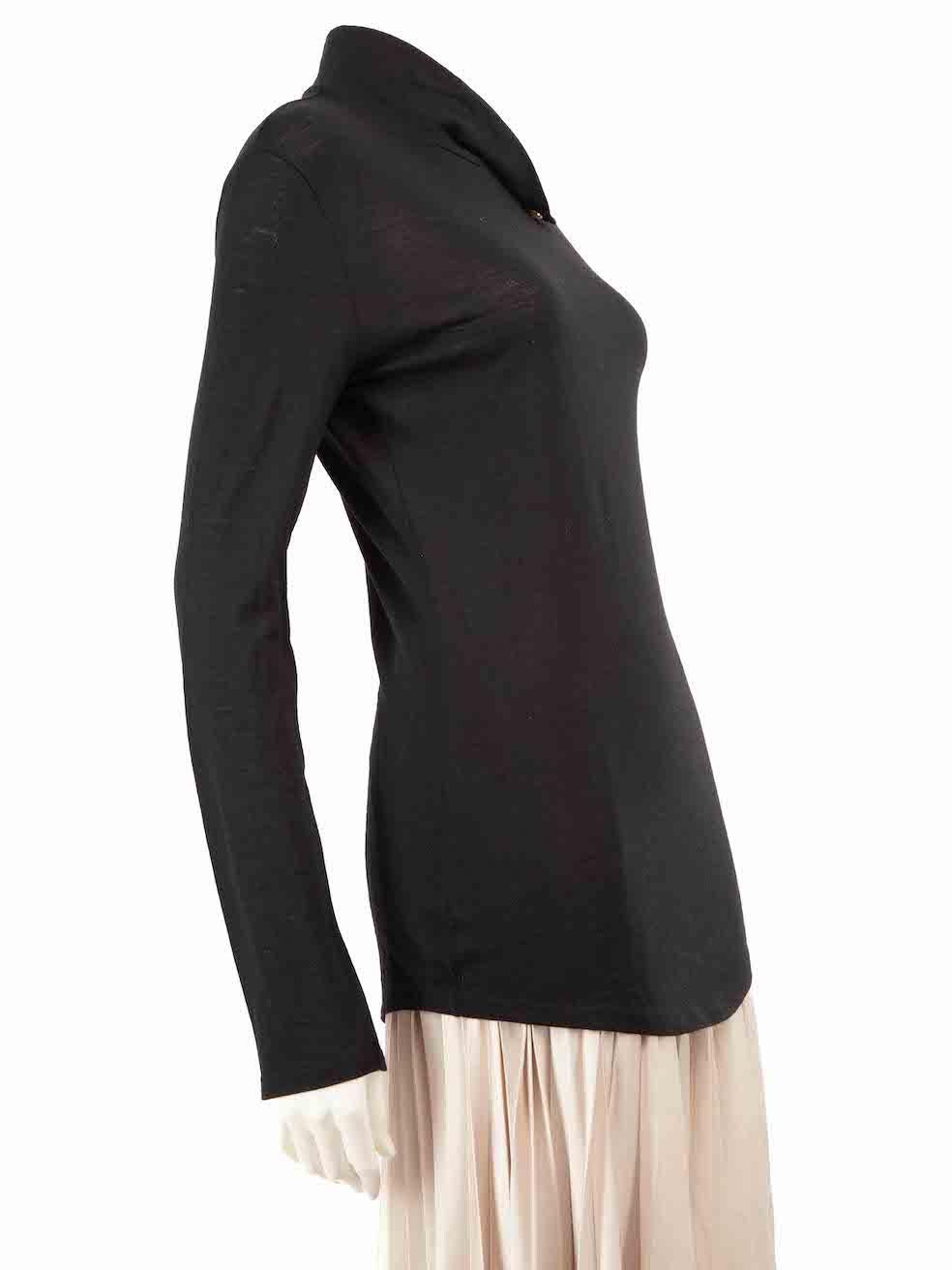 CONDITION is Very good. Hardly any visible wear to the jumper is evident on this used Balmain designer resale item.
 
 
 
 Details
 
 
 Black
 
 Wool
 
 Long sleeves jumper
 
 Fine knitted
 
 Stretchy
 
 Turtleneck
 
 Gold button closure on