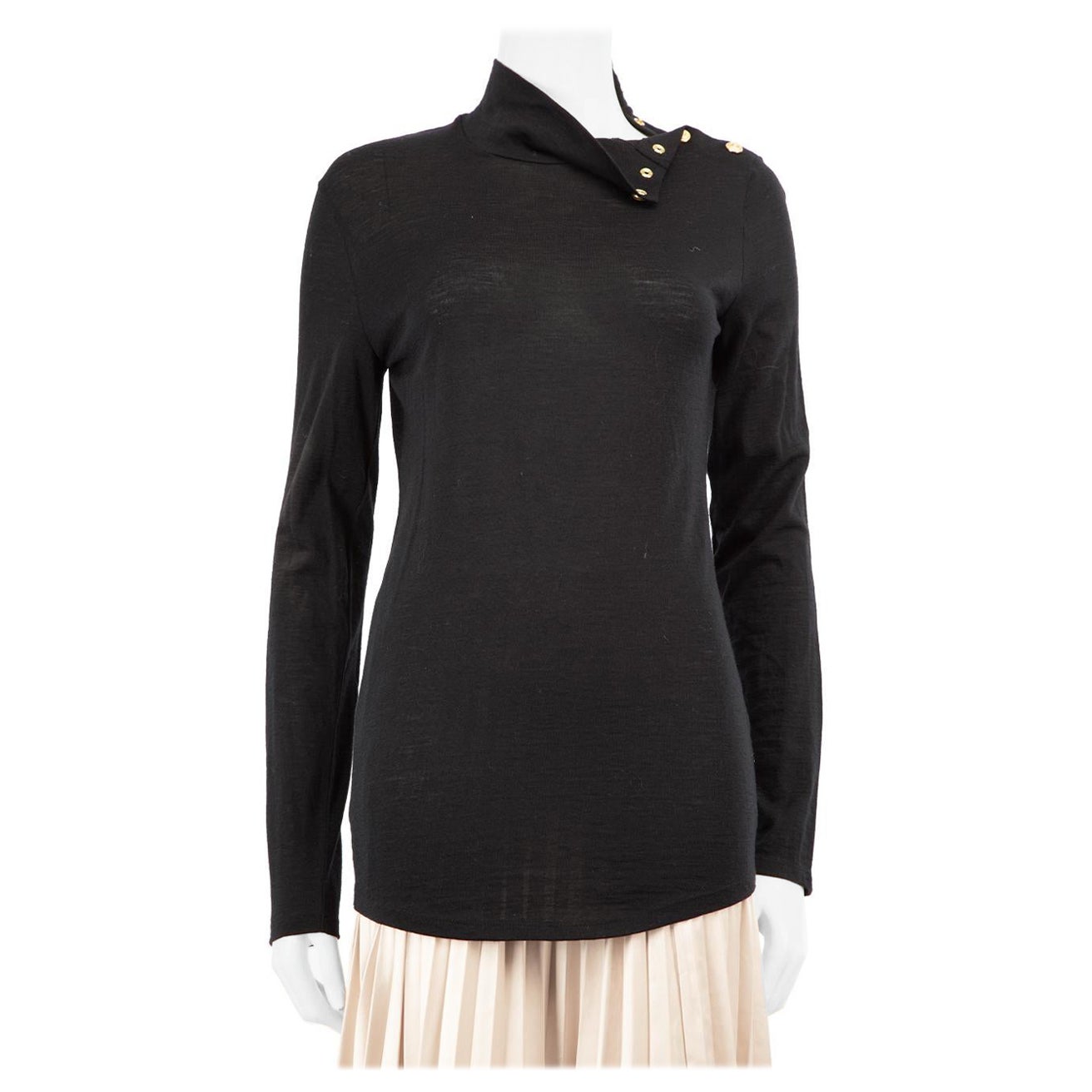 Jersey de cuello alto con detalle de botones negro Balmain Talla L en venta