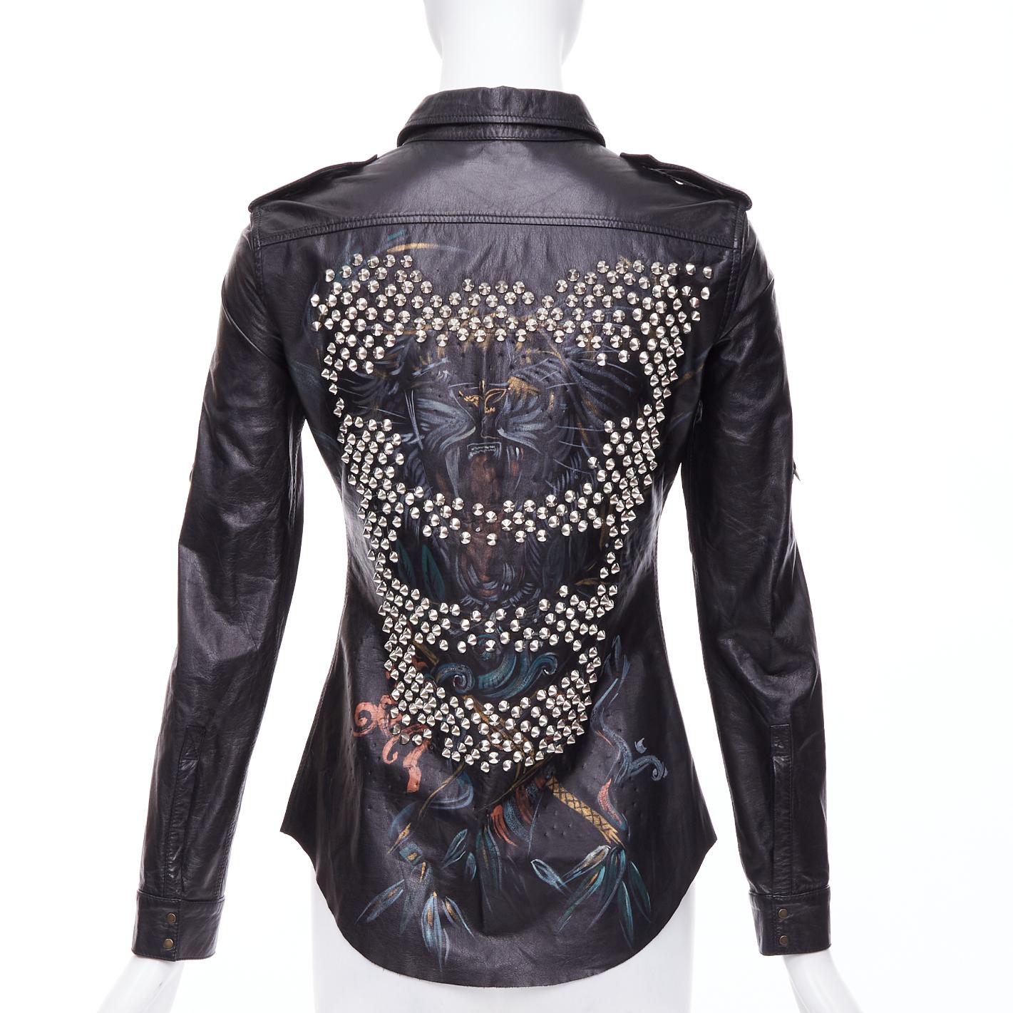 BALMAIN black calfskin multicolor paint studded punk leather shirt FR36 S
Reference: NKLL/A00271
Brand: Balmain
Designer: Olivier Rousteing
Material: Leather
Color: Black, Multicolour
Pattern: Photographic Print
Closure: Snap Buttons
Extra Details: