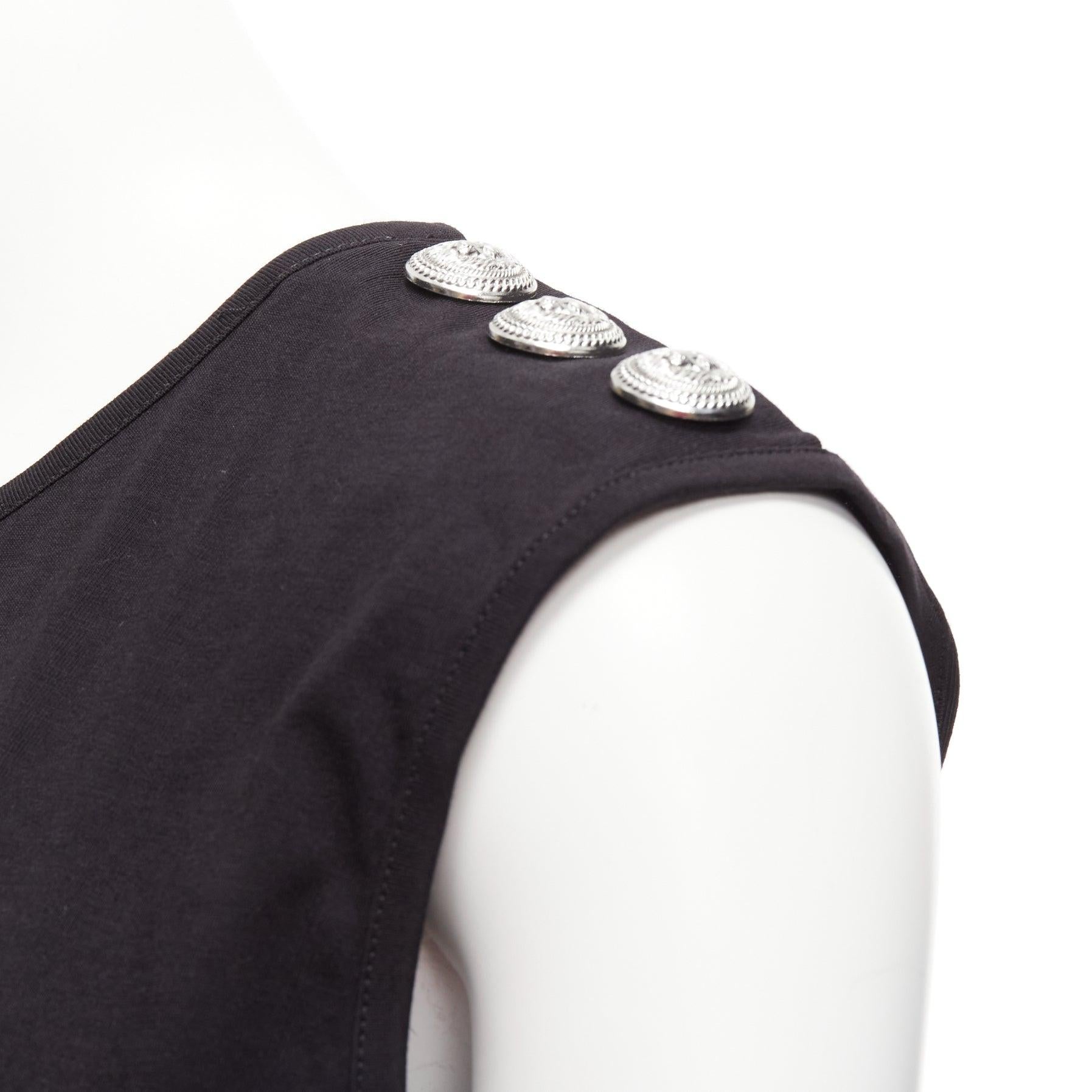 BALMAIN black cotton crest logo silver button shoulder tank top vest FR34 XS
Reference: AAWC/A01115
Brand: Balmain
Designer: Olivier Rousteing
Material: Cotton
Color: Black, White
Pattern: Solid
Closure: Pullover
Extra Details: Silver button