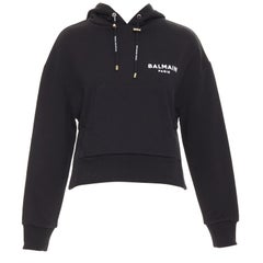 BALMAIN black cotton flocked felt logo print side split cropped fleece hoodie XS