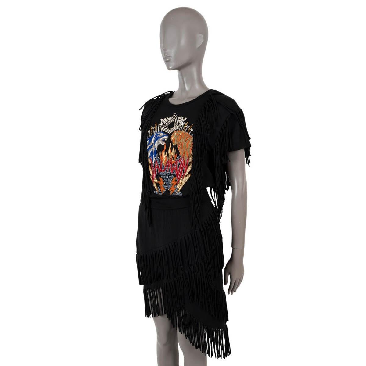 100% authentic Balmain asymmetric dress in black jersey cotton (46%), modal (46%) and elastane (8%). Features with rock'n'roll like multicolor embroidery and rhinestone embellishments, asymmetric fringe trims, a crewneck and short sleeve. Unlined.