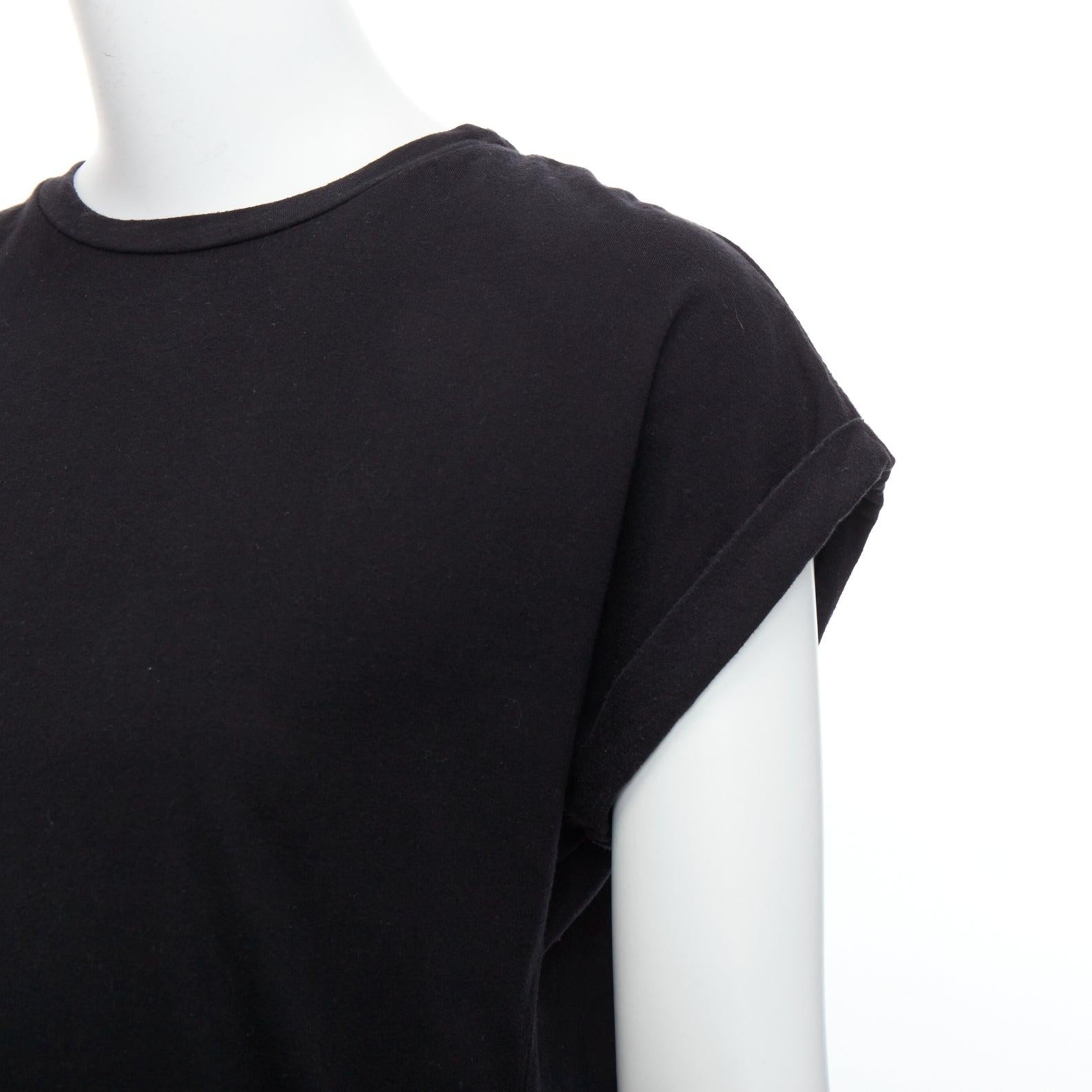 BALMAIN black cotton rolled cuff cap sleeve minimal tshirt FR34 XS
Reference: YIKK/A00110
Brand: Balmain
Designer: Olivier Rousteing
Material: Cotton
Color: Black
Pattern: Solid
Closure: Pullover
Made in: UE

CONDITION:
Condition: Good, this item