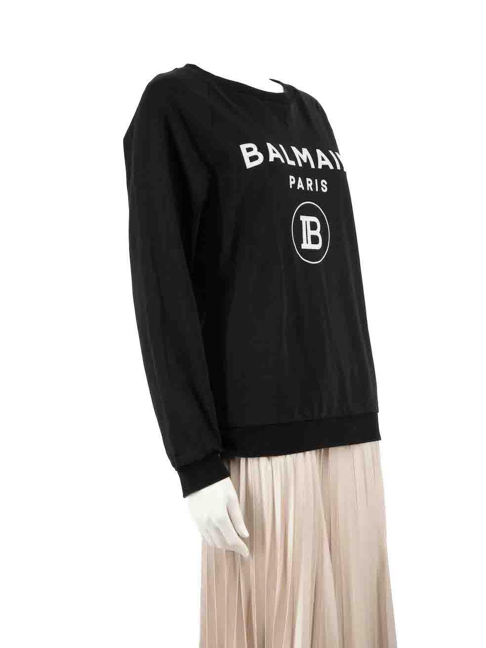 CONDITION is Very good. Minimal wear to sweatshirt is evident. Light wear to fabric surface which shows some light discolouration and wear on flocked logo and hemline on this used Balmain designer resale item.
 
 
 
 Details
 
 
 Black
 
 Cotton
 

