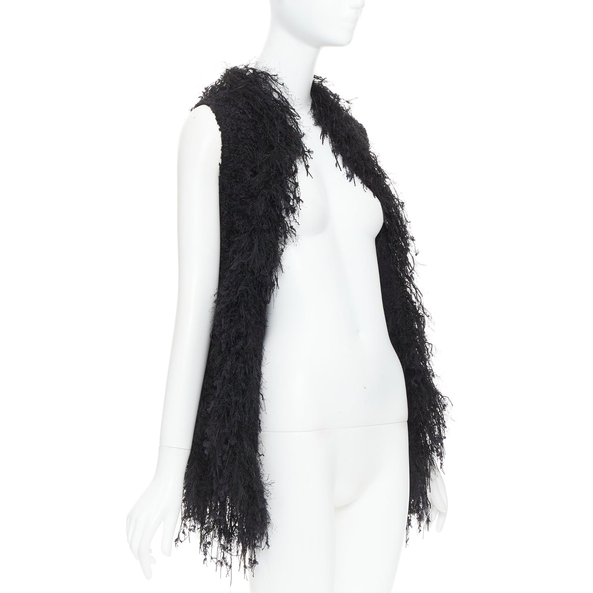 BALMAIN black fringe tweed gold varsity buttons drape front vest FR36 S
Reference: AAWC/A01441
Brand: Balmain
Designer: Olivier Rousteing
Material: Viscose, Blend
Color: Gold, Black
Pattern: Tweed
Made in: France

CONDITION:
Condition: Excellent,