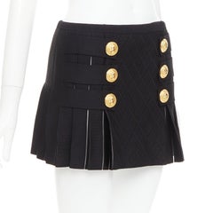 BALMAIN black gold lion buttons diamond grid knit pleated mini skirt FR34 XS
