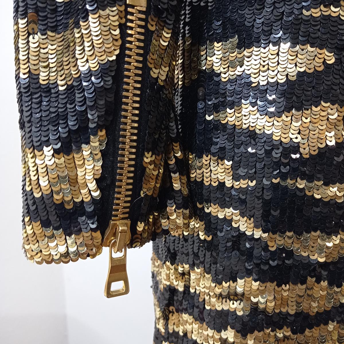 balmain black and gold dress