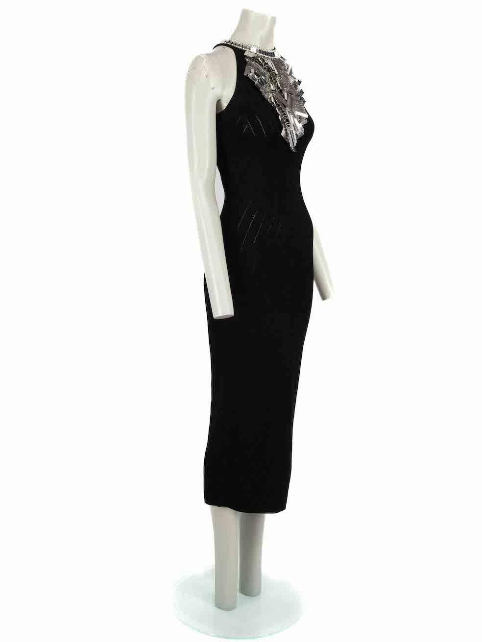 CONDITION is Very good. Minimal wear to dress is evident. Minimal wear to the sequin embellishment with scratches to the sequins on this used Balmain designer resale item.
 
Details
Black
Viscose
Knit dress
Figure hugging