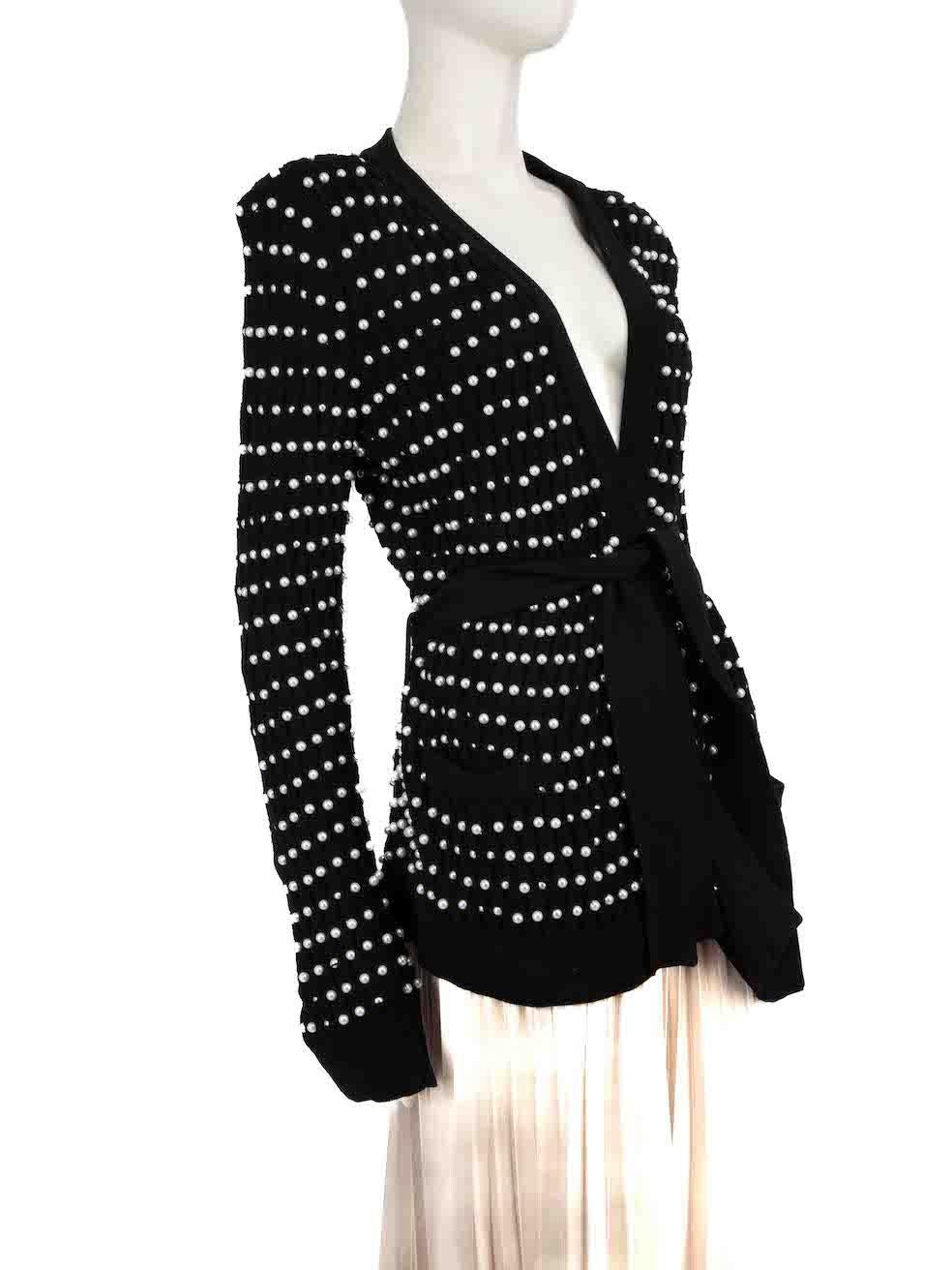 CONDITION is Very good. Minimal wear to cardigan is evident. Minimal wear to the embellishment with missing faux pearls on this used Balmain designer resale item.
 
 
 
 Details
 
 
 Black
 
 Synthetic
 
 Knit cardigan
 
 Faux peal embellished
 
