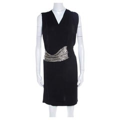 Balmain Schwarzes Minikleid aus Wolle mit Kettenhemd und KunstWickelmuster aus Strick M