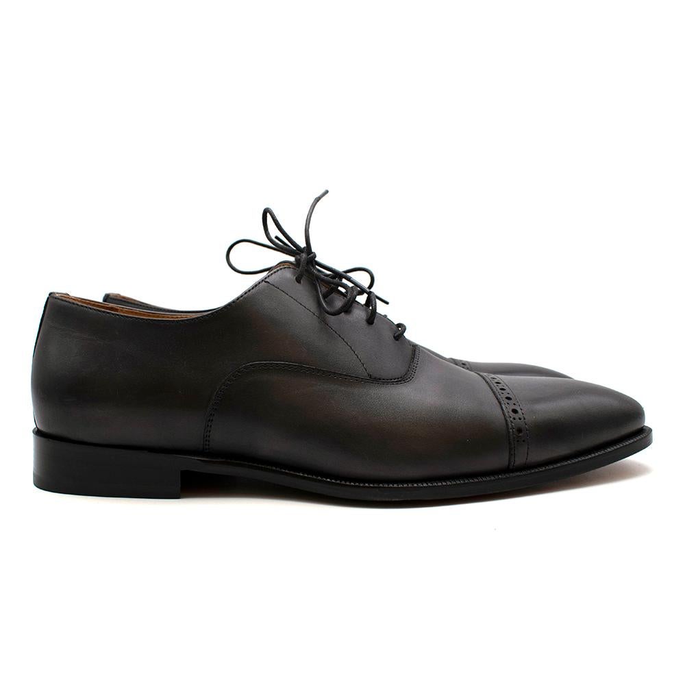 Balmain Black Leather Men's Derbies 

- Washed out black leather 
- Round toe 
- Lace-up fastening 
- Branded innersole 
- Low heel
- Decorative perforations 
- UK 10/EU 44

Heel Height: 2.5cm
Sole length: 32cm 
Height: 10cm
Width: 10.5com 
