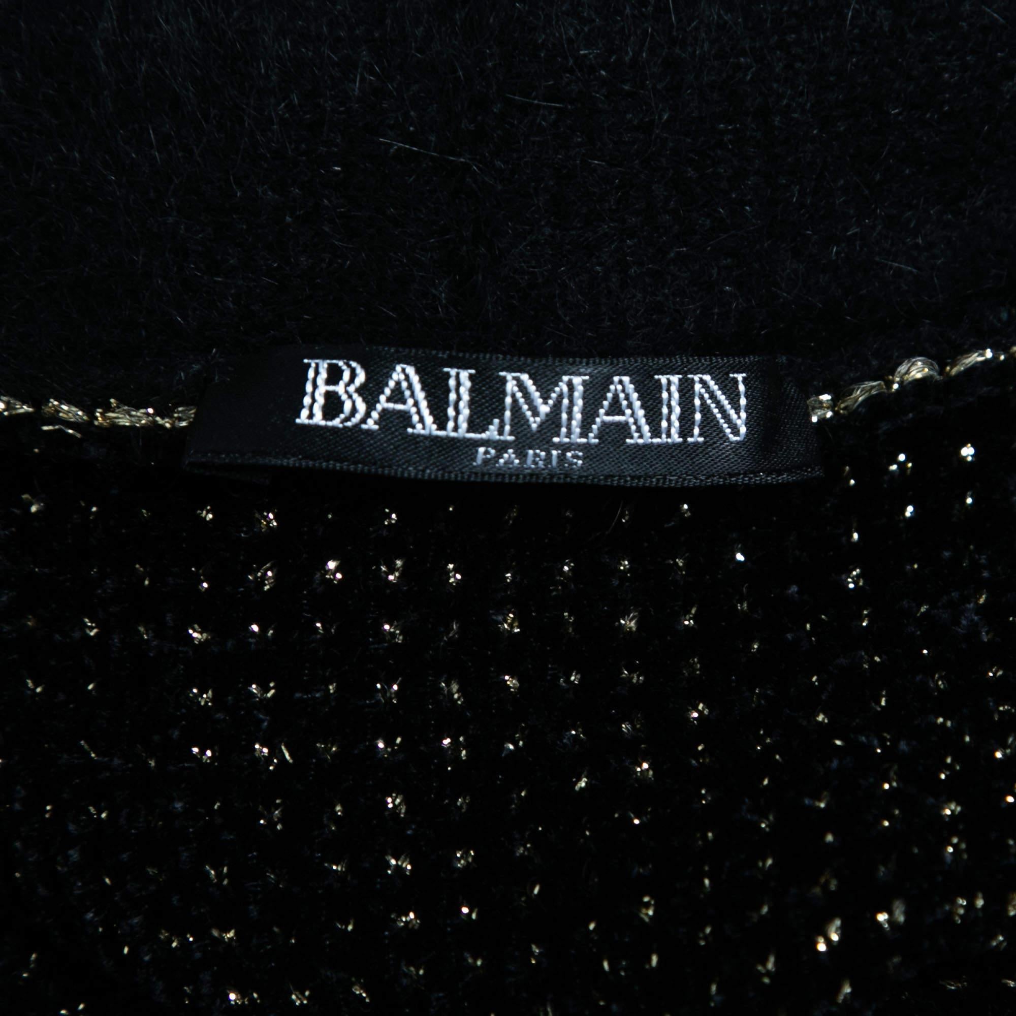 Bring elegance, sophistication, and style to your wardrobe with this Balmain cardigan. Made from good fabric and styled with classy elements, this cardigan is a great pick for the winter.

Accessories: Belt