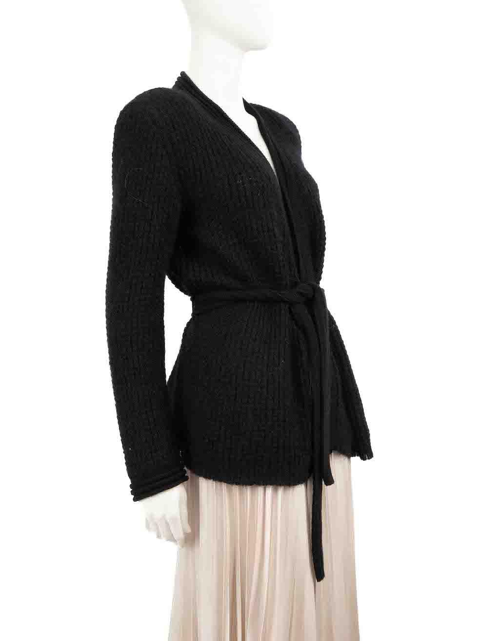 CONDITION is Very good. Hardly any visible wear to cardigan is evident on this used Balmain designer resale item.
 
 
 
 Details
 
 
 Black
 
 Mohair
 
 Knit cardigan
 
 Long sleeves
 
 Tie waist fastening
 
 Shoulder pads
 
 
 
 
 
 Made in France
