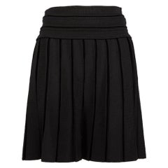 Balmain Minifalda negra plisada con cremallera Talla M