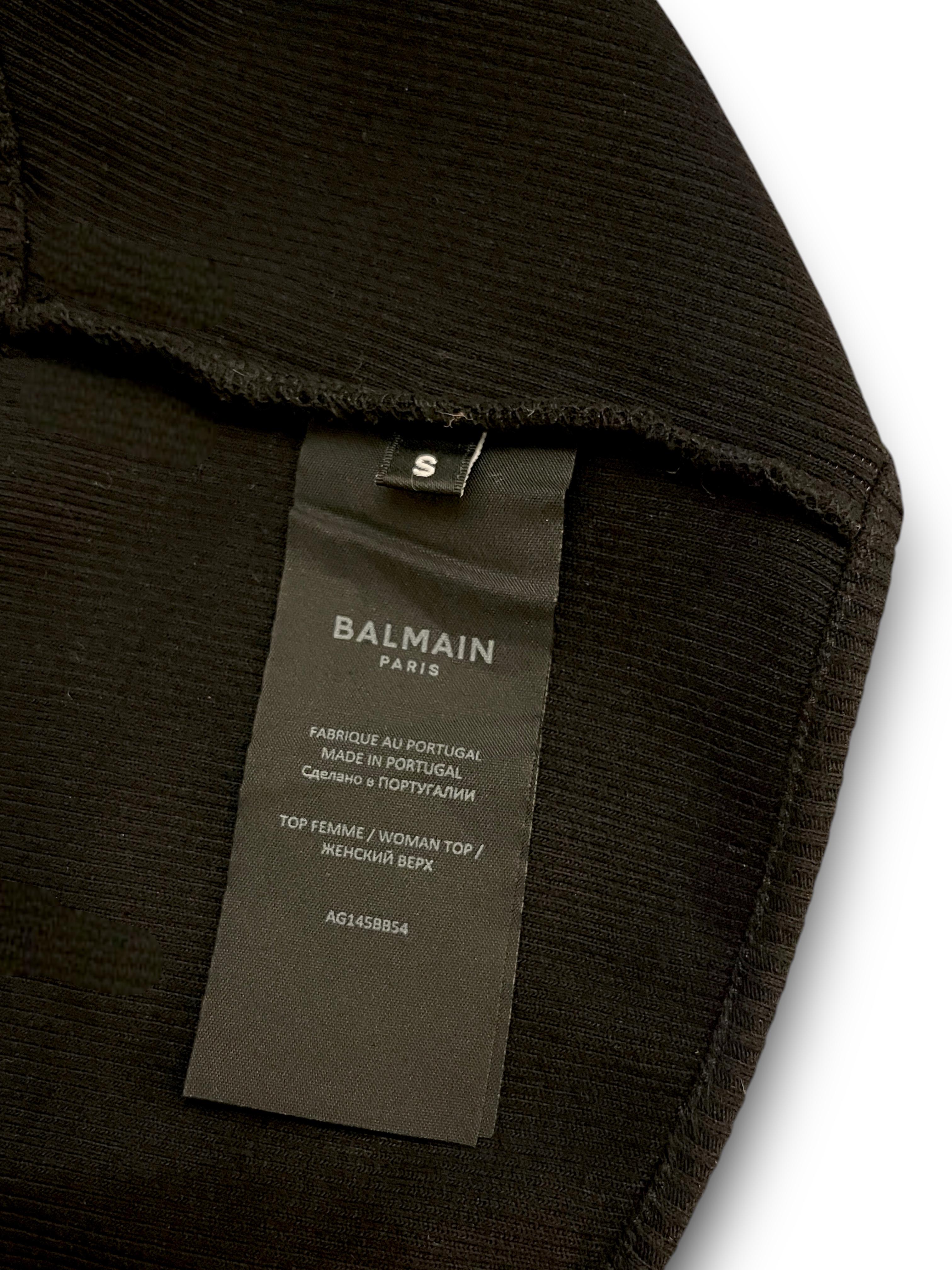 Camiseta de tirantes negra de canalé con corte asimétrico Balmain - Minimalismo inspirado en las pasarelas en venta 4