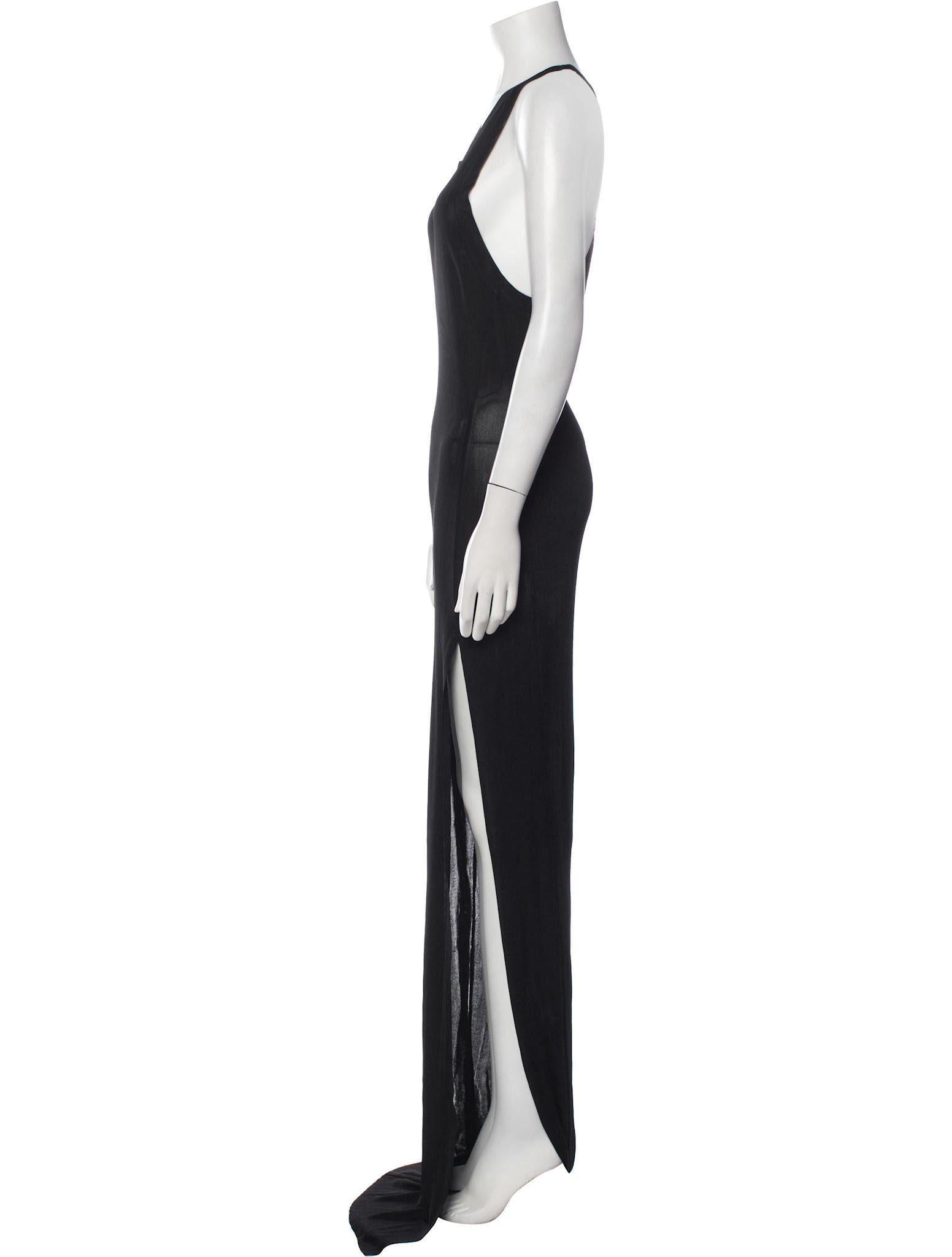 BALMAIN BLACK SCOOP NECK LONG DRESS (MEDIUM)

This sleek Balmain evening gown features a minimalist yet elegant silhouette with a classic scoop neckline and a form-fitting design. Crafted from 100% viscose, the dress drapes beautifully, creating a