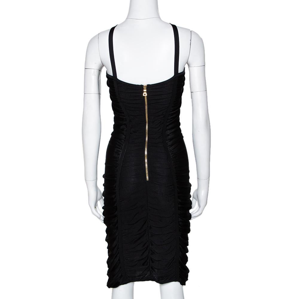 A classic LBD (Little Black Dress) is a closet essential as it can be dressed up or down for a host of occasions. When design houses like Balmain create their versions of a classic, we know we are in for a must-have number. This dress is a perfect
