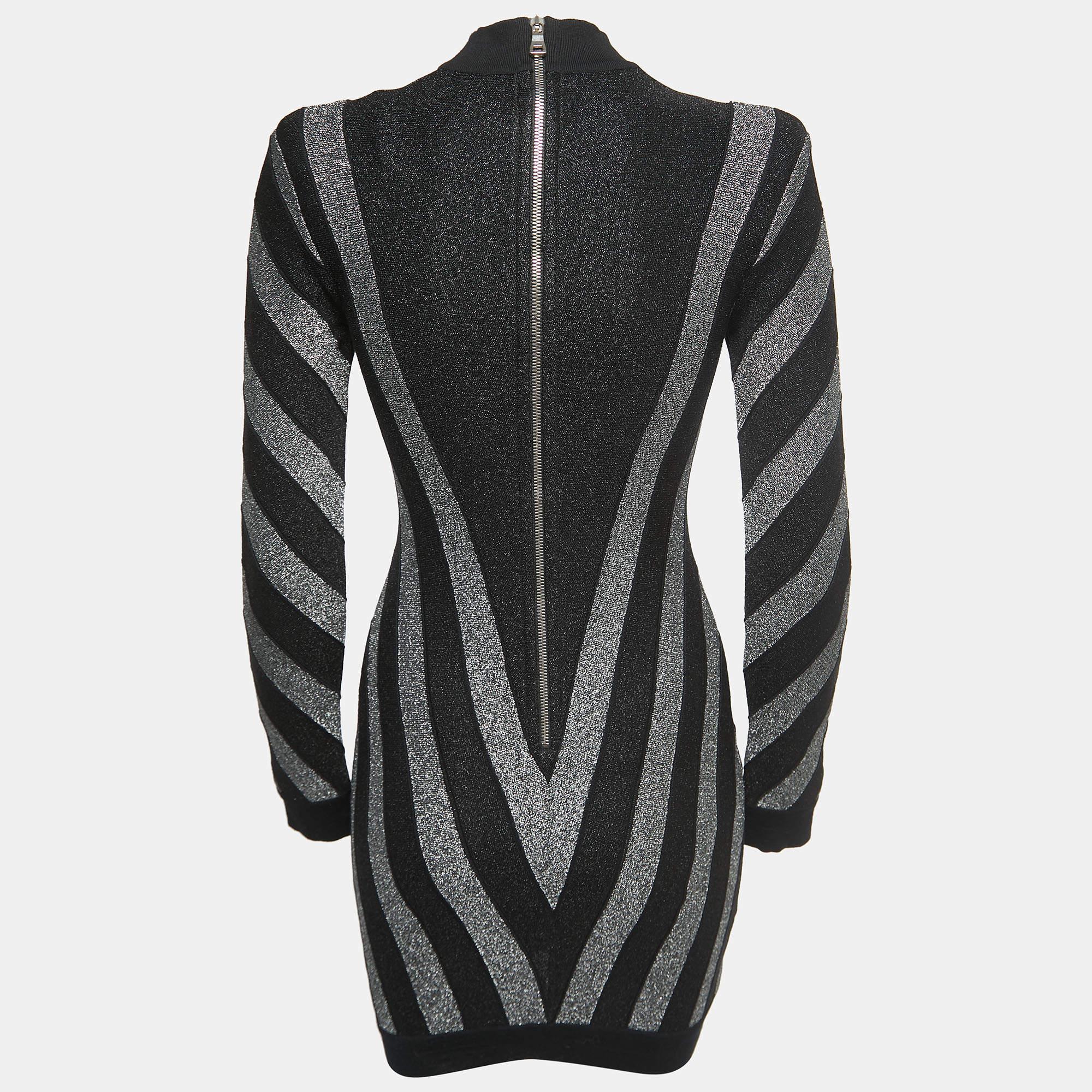 This glittery Balmain bodycon dress has a lovely silhouette and stripe details. It is made from the finest materials and is bound to give you comfort.

