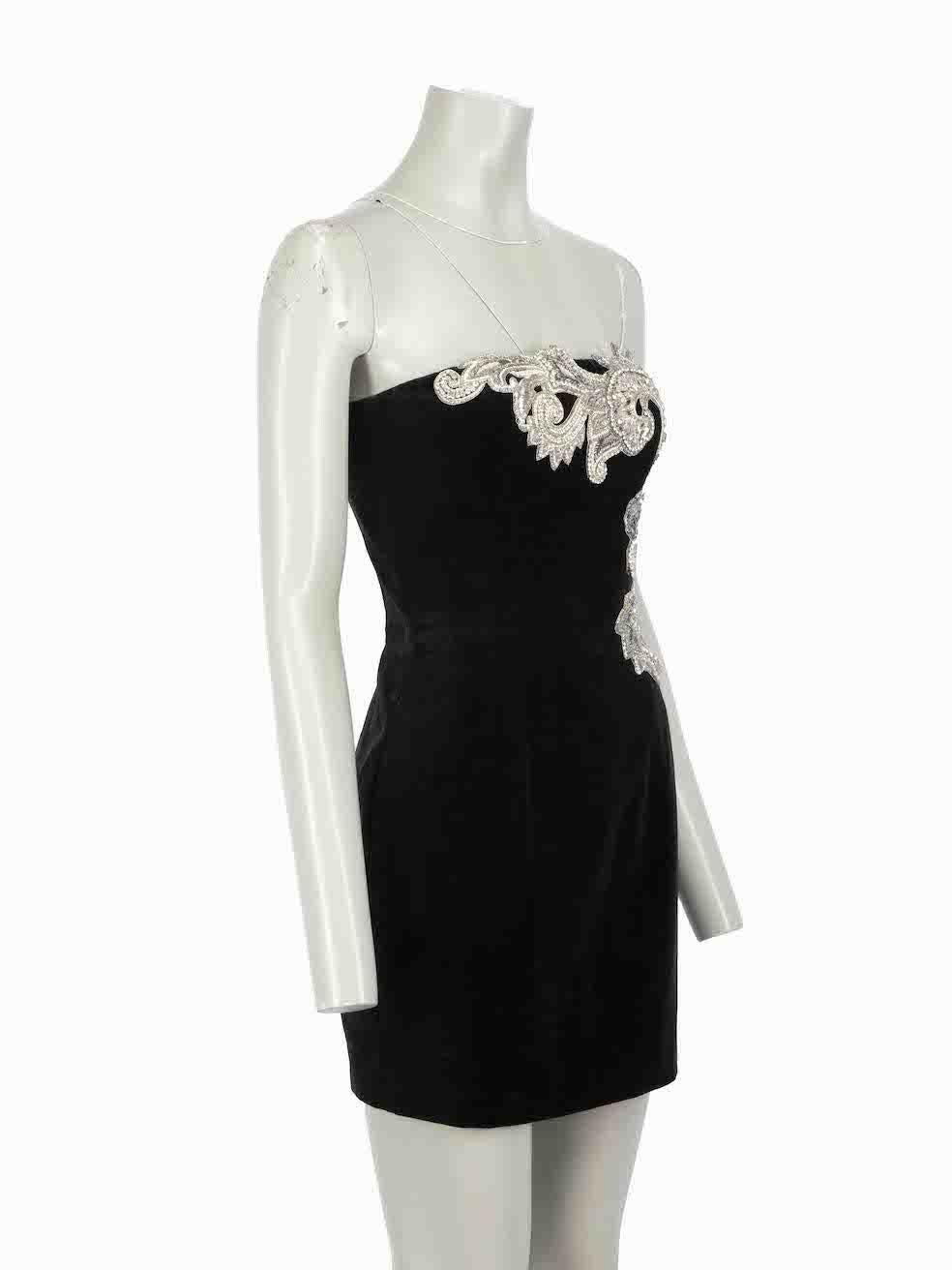 CONDITION is Very good. Minimal wear to dress is evident. Minimal wear to the embellishment with two missing crystals on this used Balmain designer resale item.
 
Details
Black
Velvet
Dress
Strapless
Figure hugging fit
Mini
Silver crystal