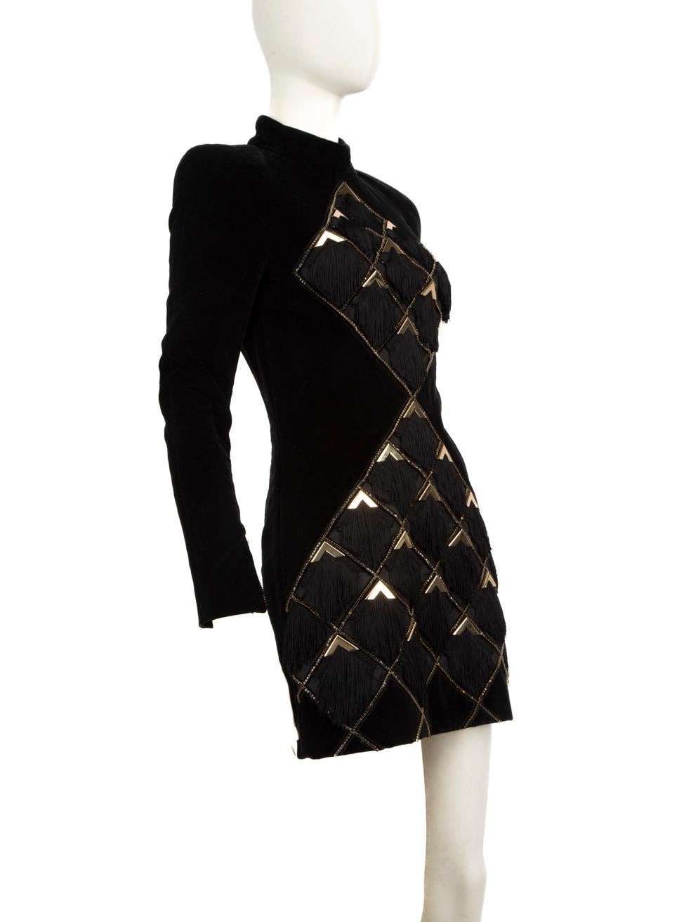CONDITION is Very good. Minimal wear to dress is evident. Minimal wear to the metal detailing on the front where some small scratches can be seen and some missing gems on this used Balmain designer resale item.
 
 
 
 Details
 
 
 Black
 
 Velvet
 
