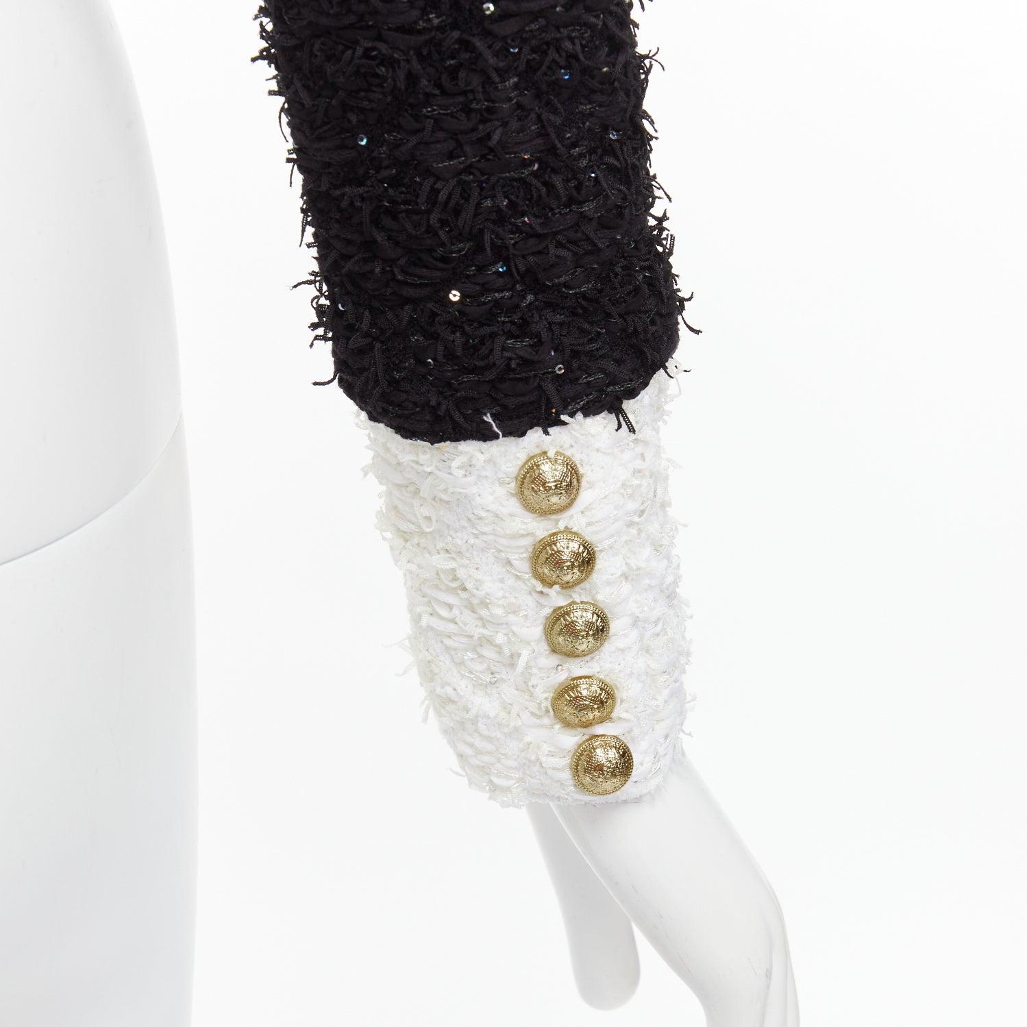 BALMAIN black white metallic tweed 4 pockets cropped blazer jacket FR34 XS
Reference: AAWC/A00729
Brand: Balmain
Designer: Olivier Rousteing
As seen on: Jisoo
Material: Viscose, Blend
Color: Black, White
Pattern: Sequins
Closure: Hook & Bar
Extra