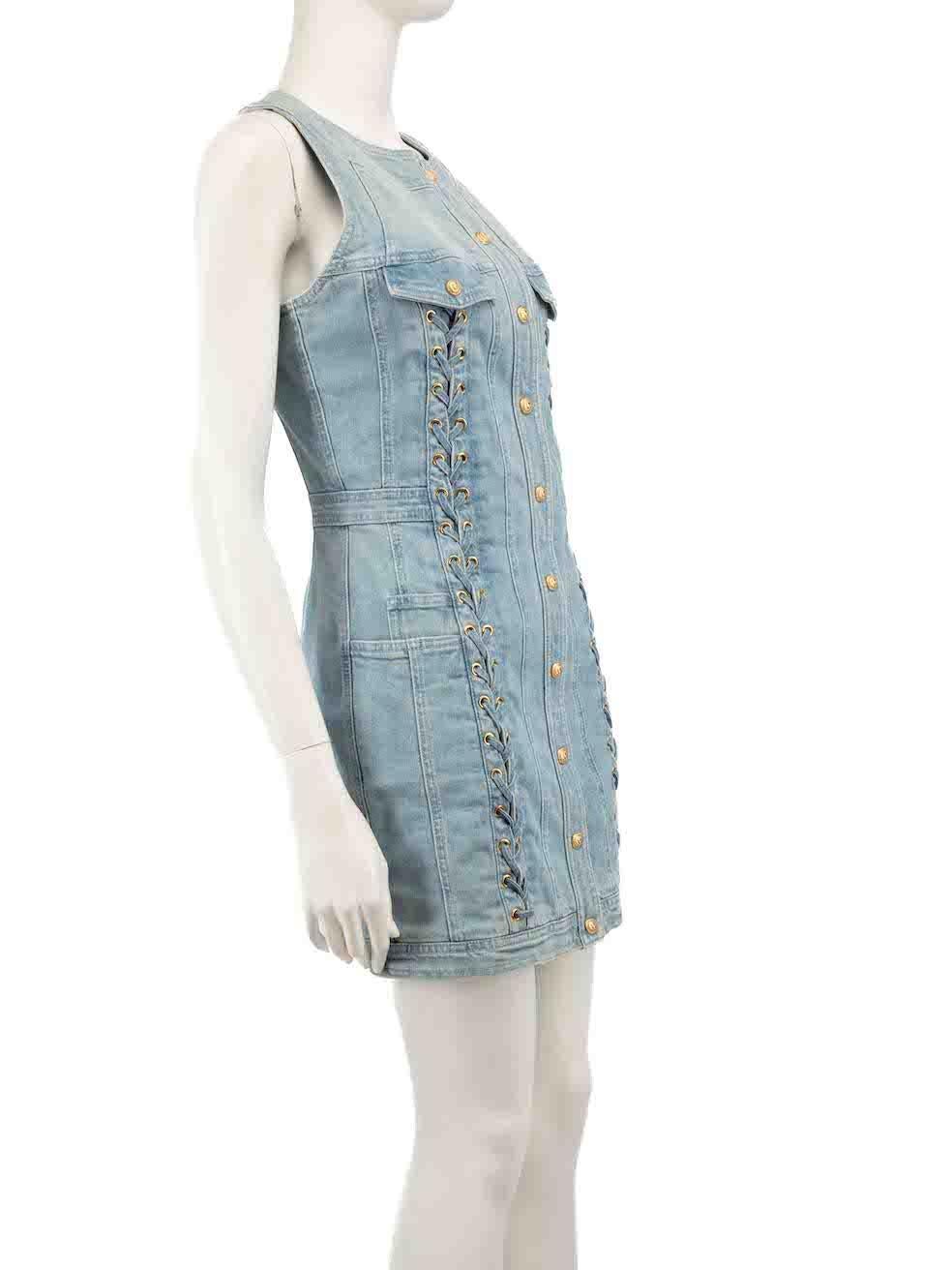 CONDITION is Very good. Minimal wear to dress is evident. Some marks and discolouration on the inside lining and the denim outer fabric. There is some tarnishing to the metal hardware on this used Balmain designer resale item.
