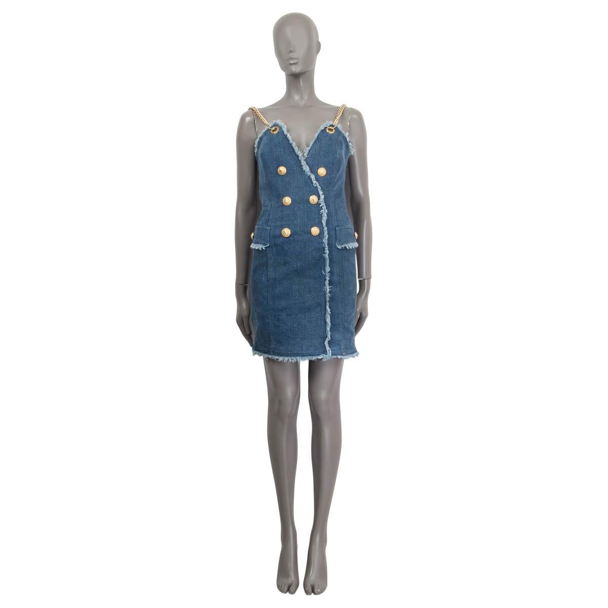 100% authentic Balmain double breasted dress in blue cotton (98%) and polyurethane (2%). Features gold chain straps, a v neck and two faux flap pockets. Opens with a golden zipper on the back. The dress shows barely visible stains on the front and