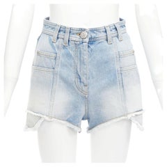 BALMAIN – blaue Cargo-Shorts aus Baumwoll-Denim mit eingesetzten Taschen und Cut-Out-Details, Größe FR36 S