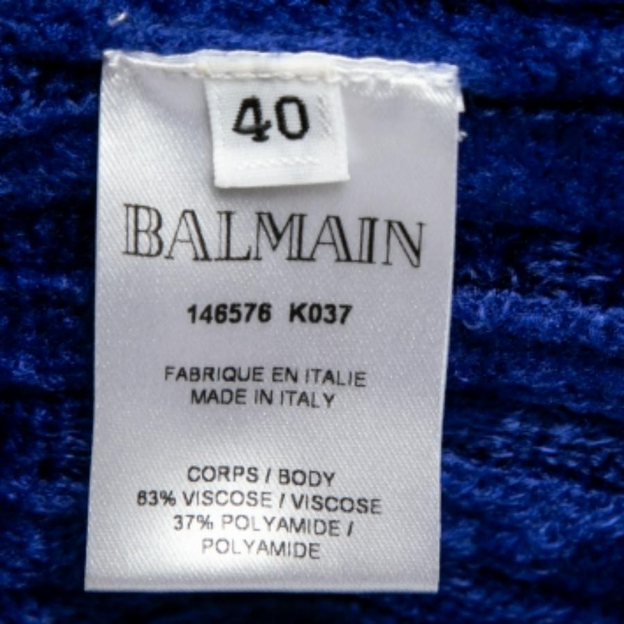 Réalisée sans effort dans un modèle chic, cette robe Balmain est facile à porter et à accessoiriser. Magnifiquement tricotée, cette robe restera à coup sûr l'une de vos préférées, saison après saison.