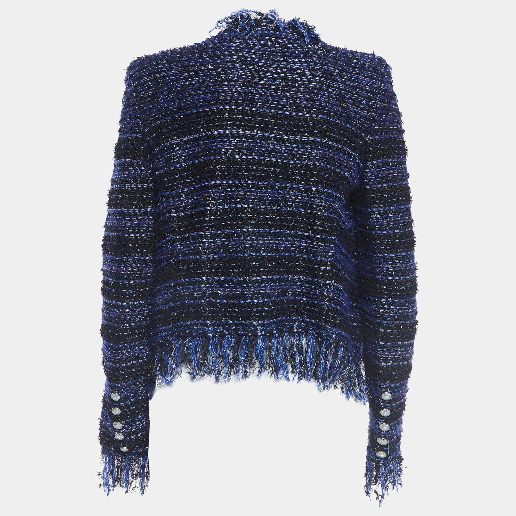 This jacket is a prize you will want to keep even if you have worn it countless times. It is from Balmain and it truly is an example of the brand's attention to quality and timeless creativity. The jacket is tailored using tweed and it has fringes,